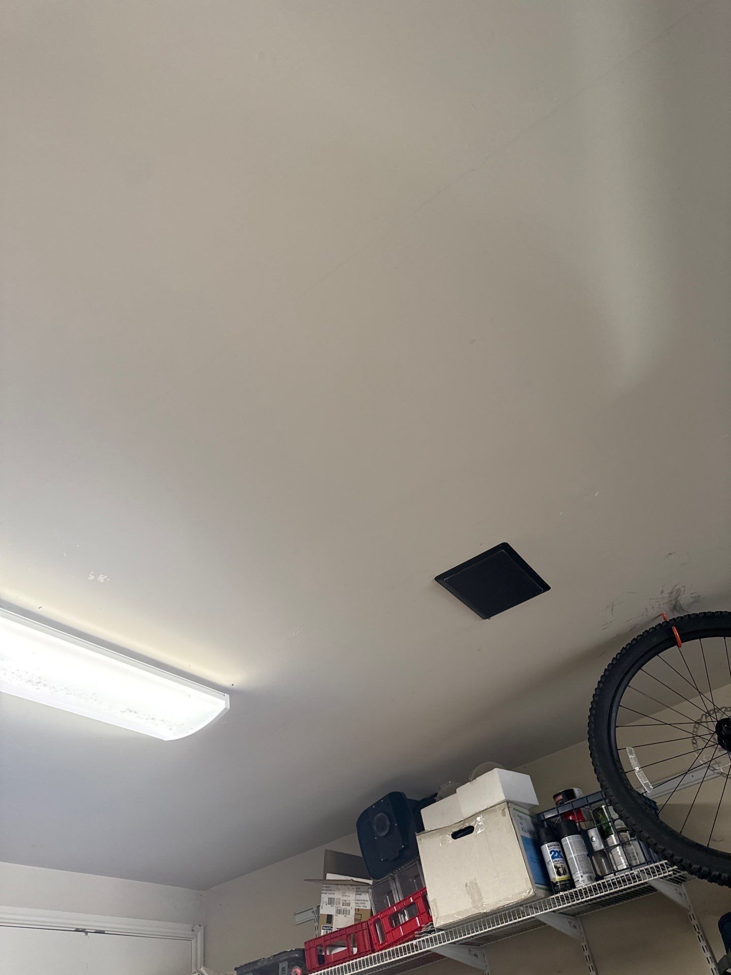 Garage ceiling ahead of garage painting in Cedar Park, TX by Hill Country Painting