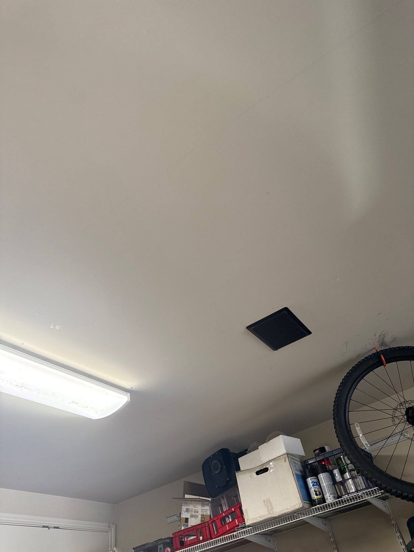 Garage ceiling ahead of garage painting in Cedar Park, TX by Hill Country Painting