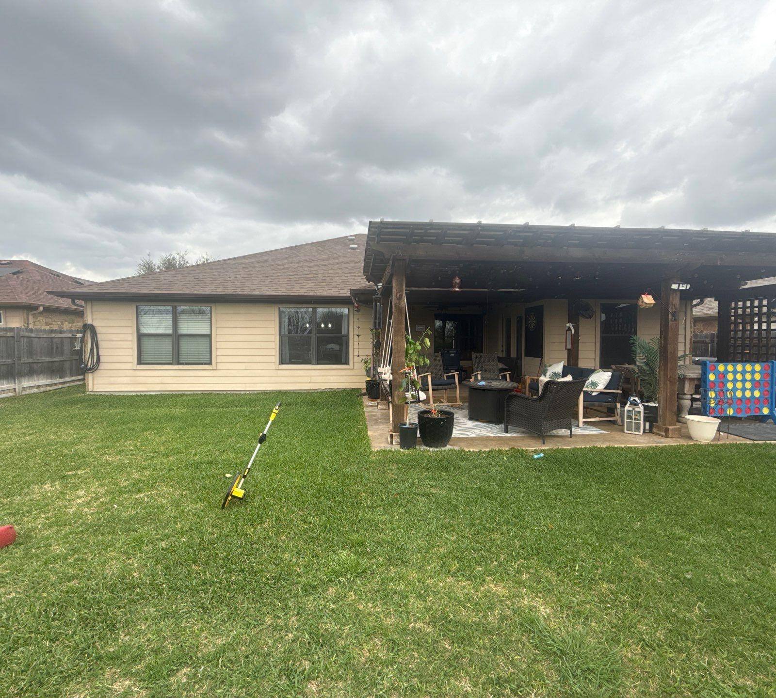 Back of the house ahead of exterior painting in Georgetown, TX by Hill Country Painting