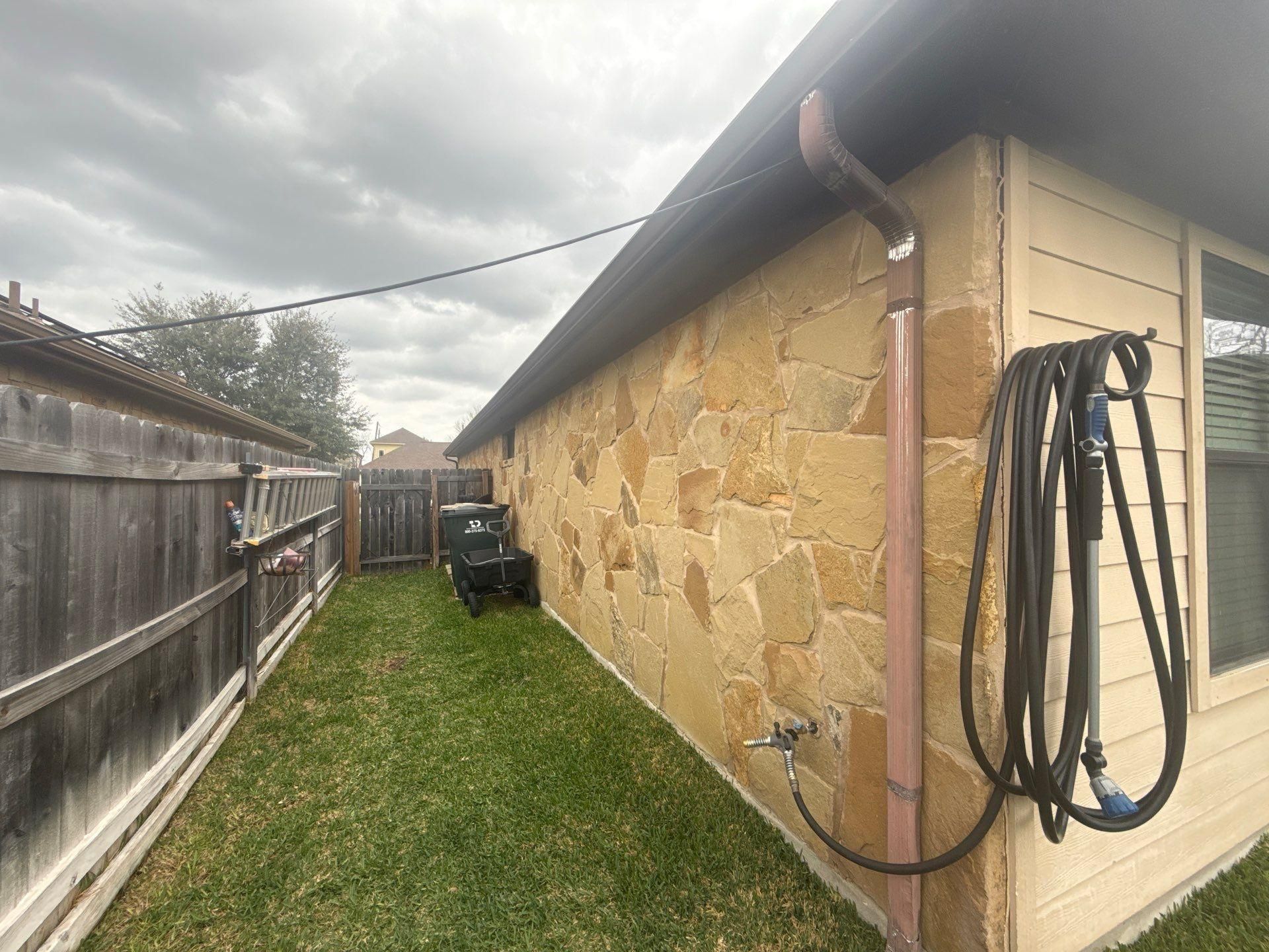 Right side of the house ahead of exterior painting in Georgetown, TX by Hill Country Painting