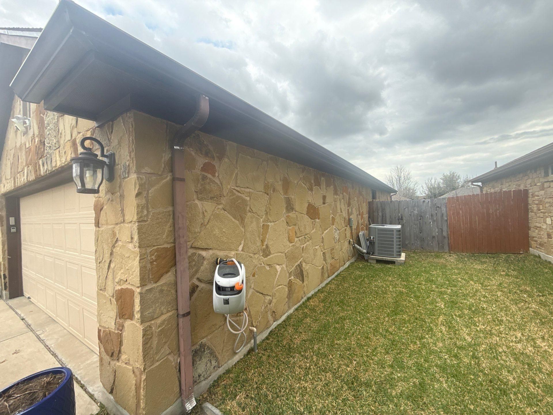 Left side of the house ahead of exterior painting in Georgetown, TX by Hill Country Painting
