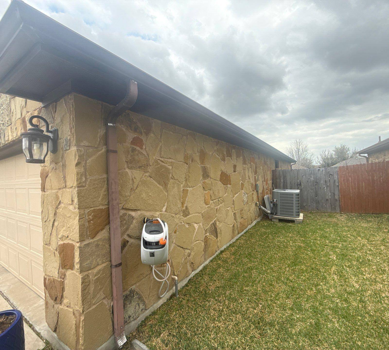 Left side of the house ahead of exterior painting in Georgetown, TX by Hill Country Painting