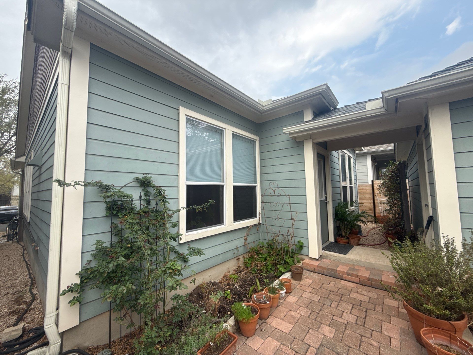 Back patio area ahead of exterior painting in Austin, TX by Hill Country Painting