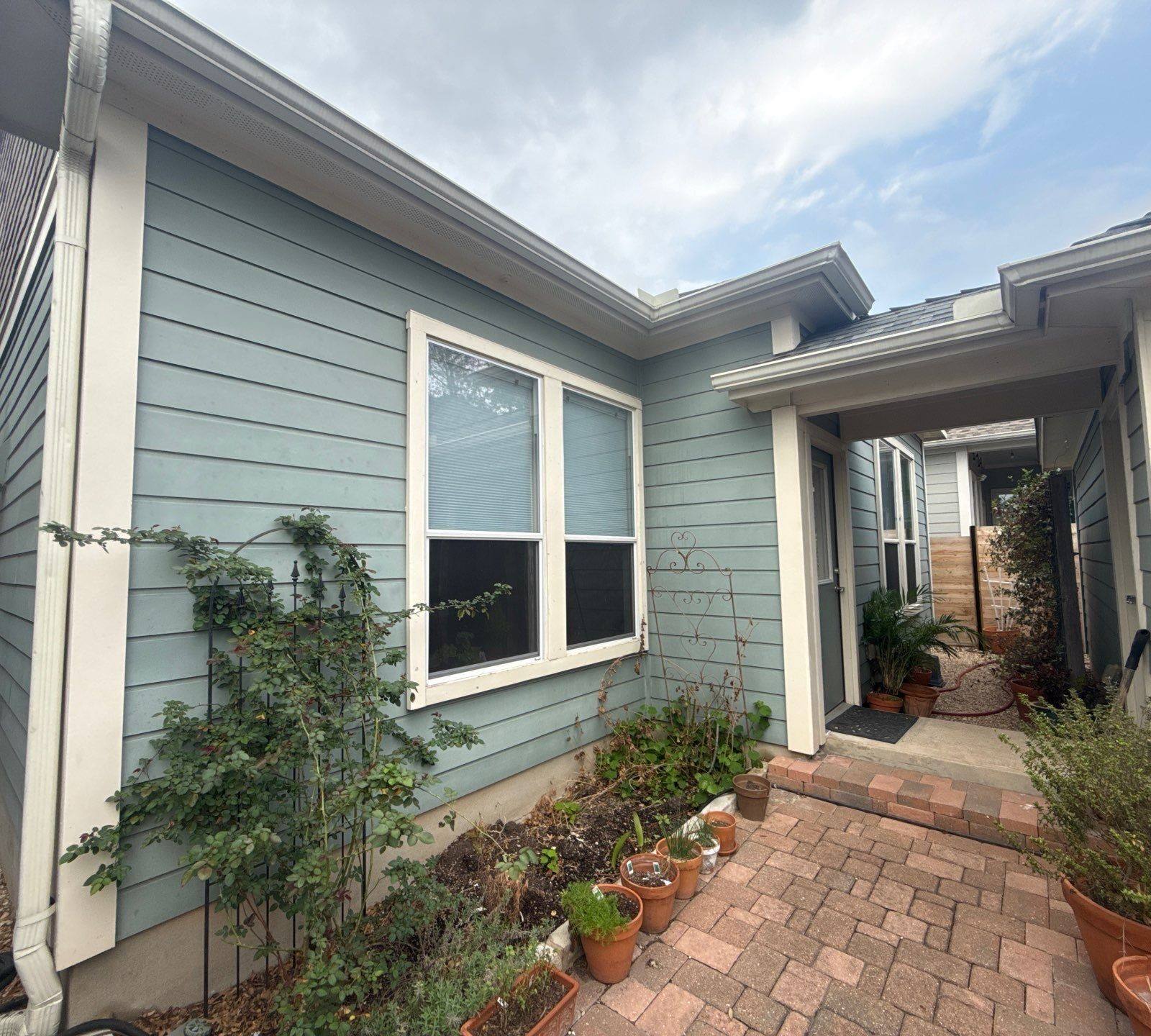 Back patio area ahead of exterior painting in Austin, TX by Hill Country Painting