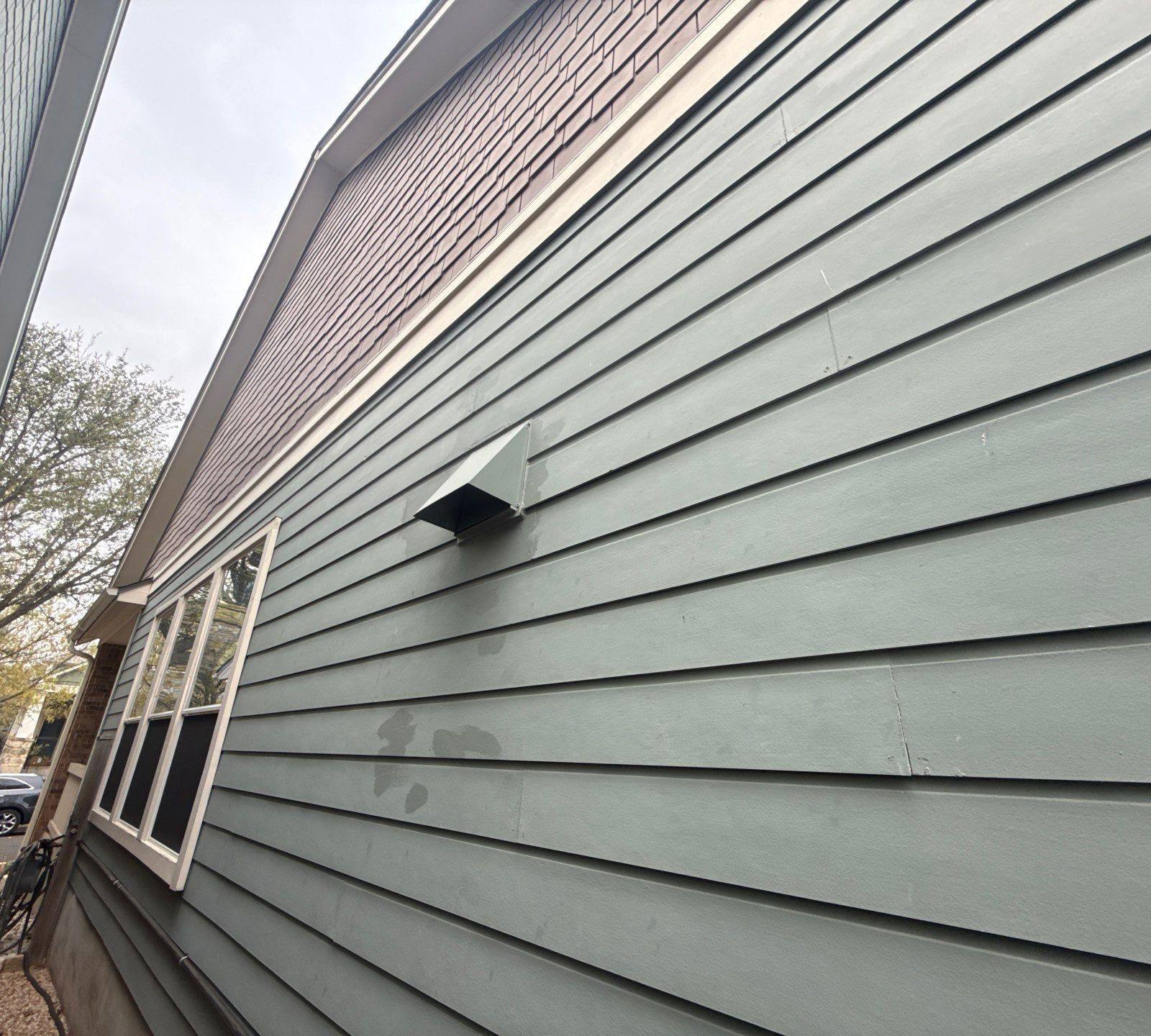 Right side of the house ahead of exterior painting in Austin, TX by Hill Country Painting