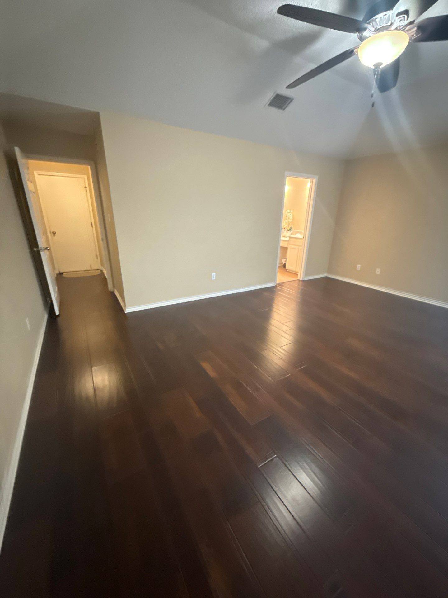Primary bedroom ahead of interior painting in Round Rock, TX by Hill Country Painting