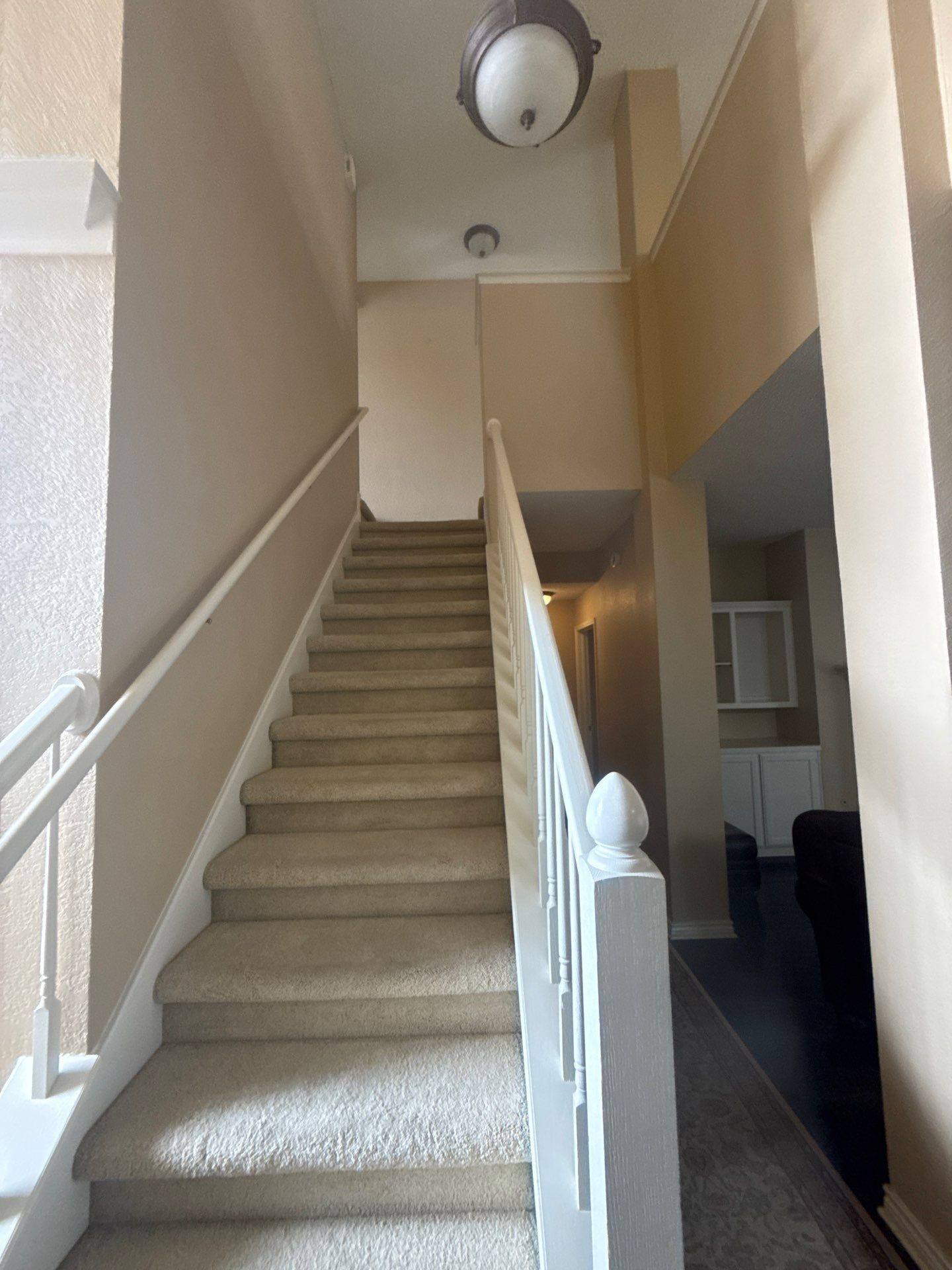 Stairwell ahead of interior painting in Round Rock, TX by Hill Country Painting