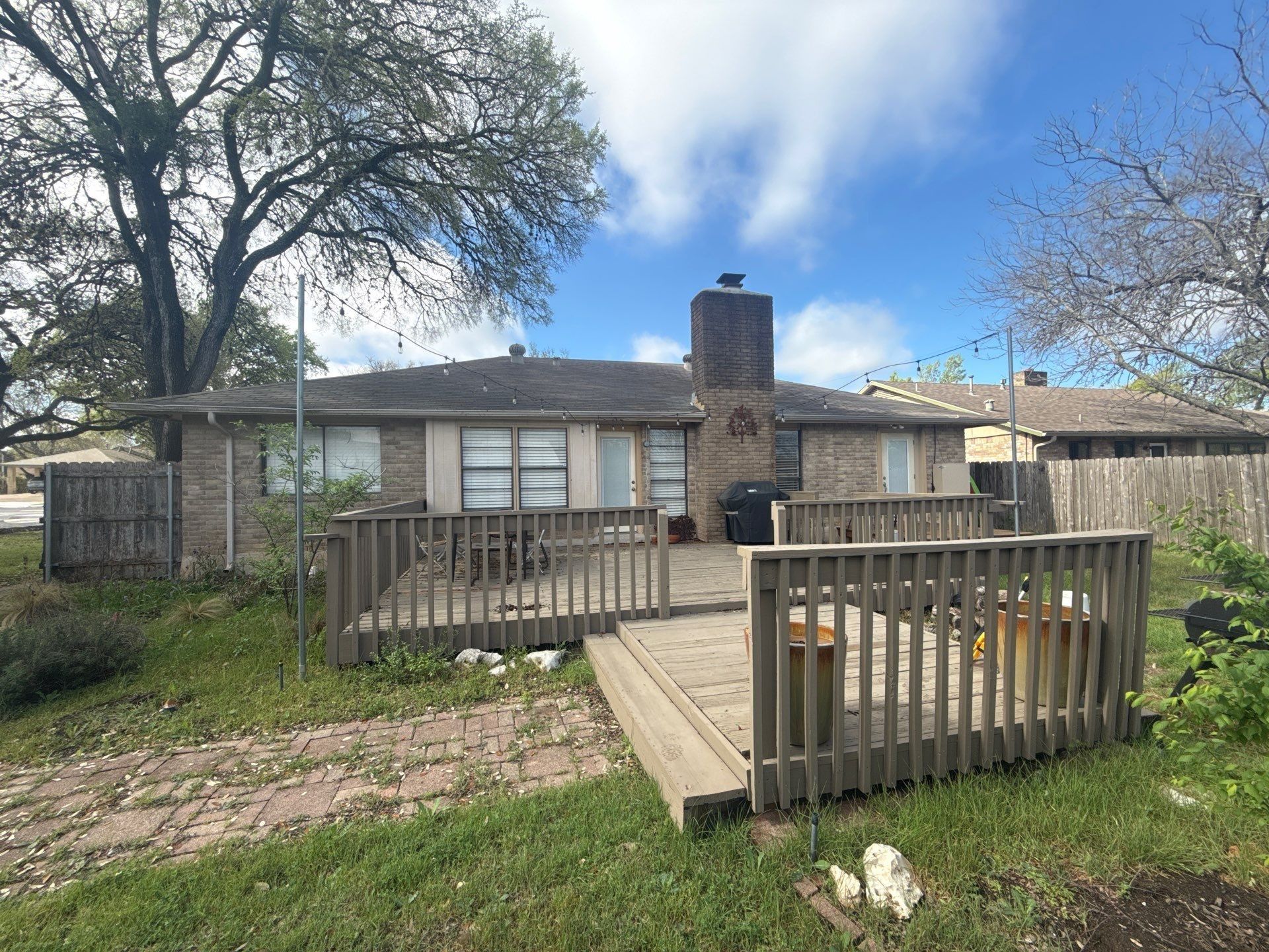 Back of the house ahead of exterior painting in Austin, TX by Hill Country Painting