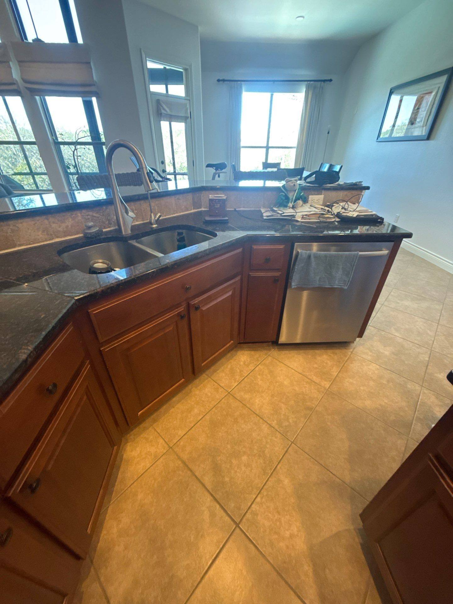Kitchen sink and cabinets ahead of cabinet painting in Dripping Springs, TX by Hill Country Painting