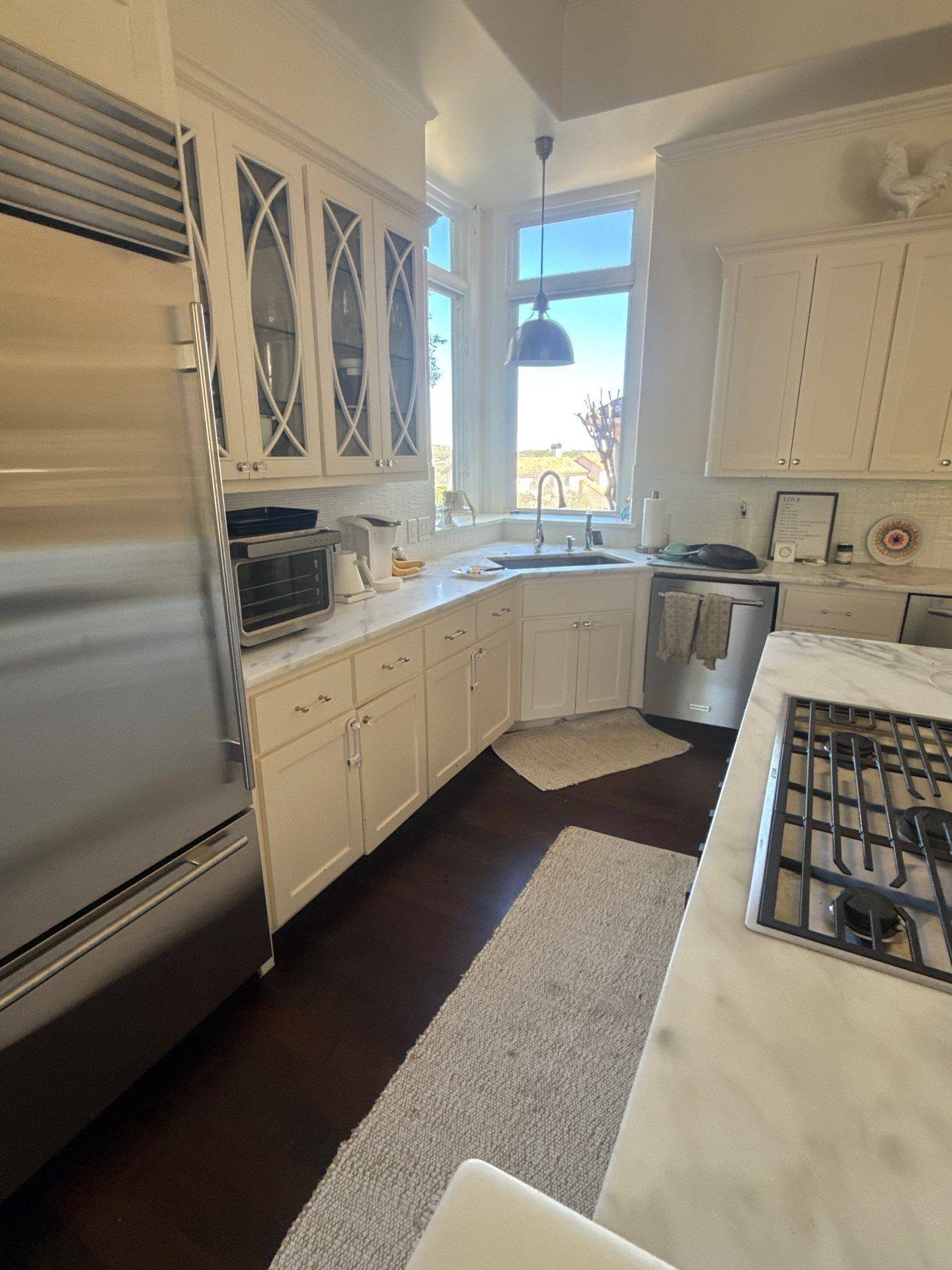Kitchen cabinetry ahead of cabinet painting in Austin, TX by Hill Country Painting