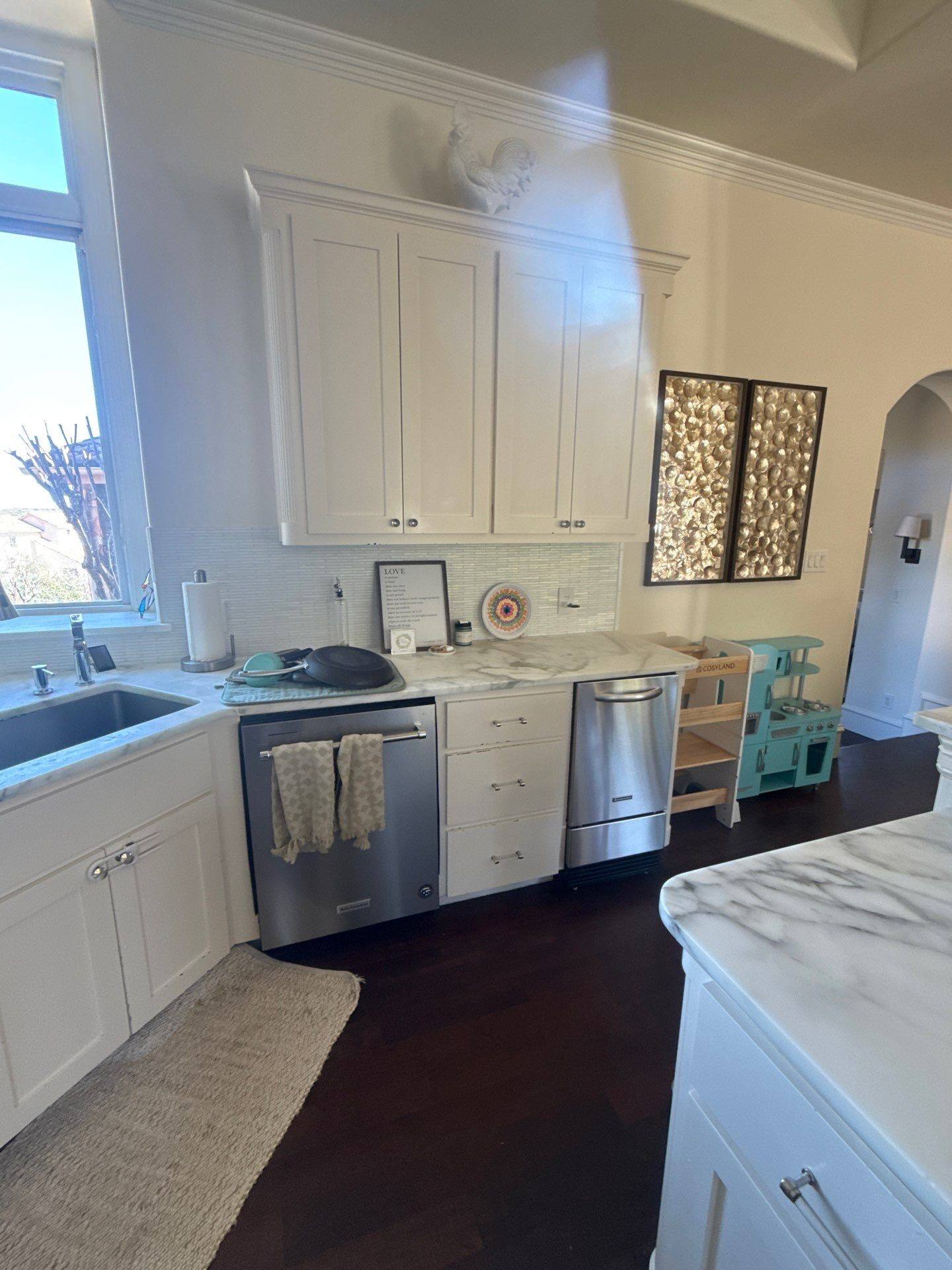 Kitchen sink and cabinets ahead of cabinet painting in Austin, TX by Hill Country Painting