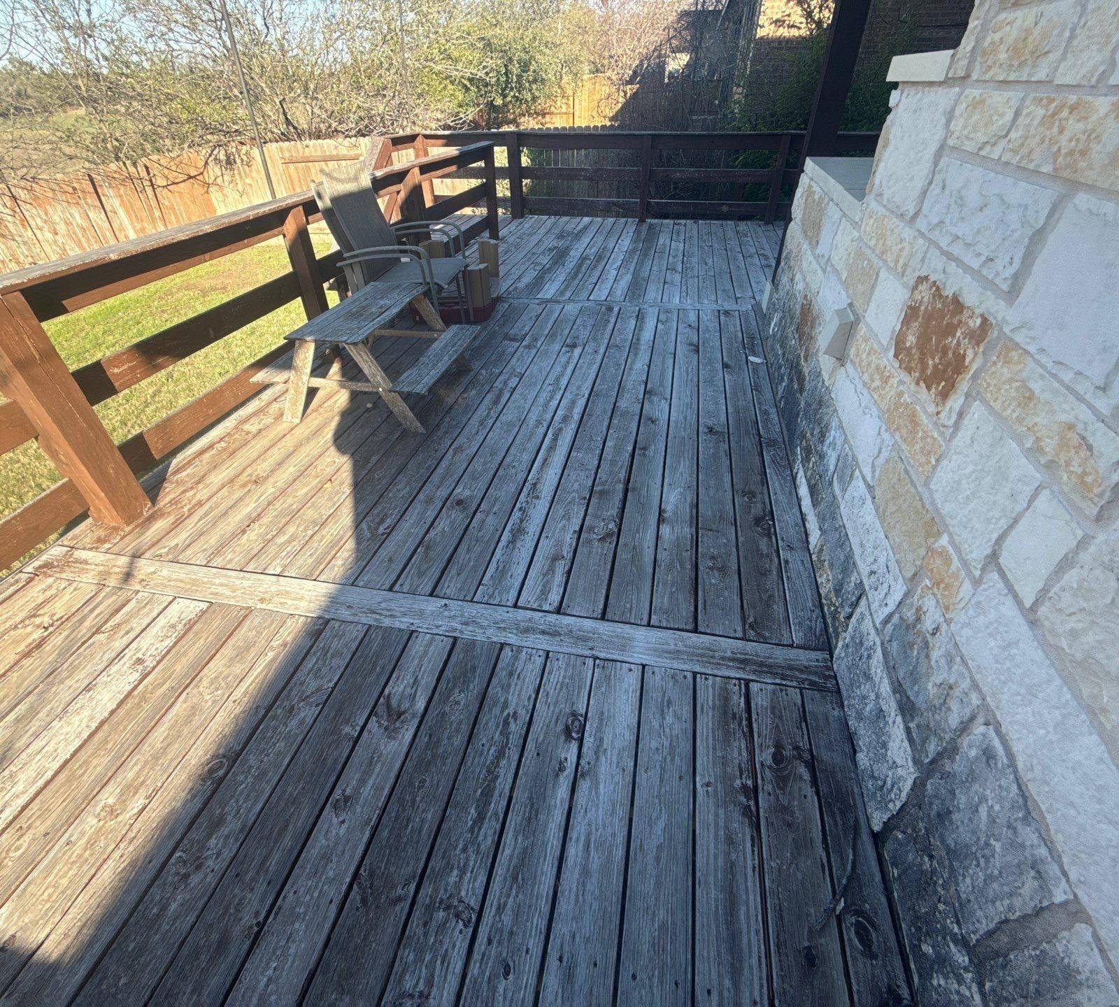 Deck ahead of staining in Cedar Park, TX by Hill Country Painting