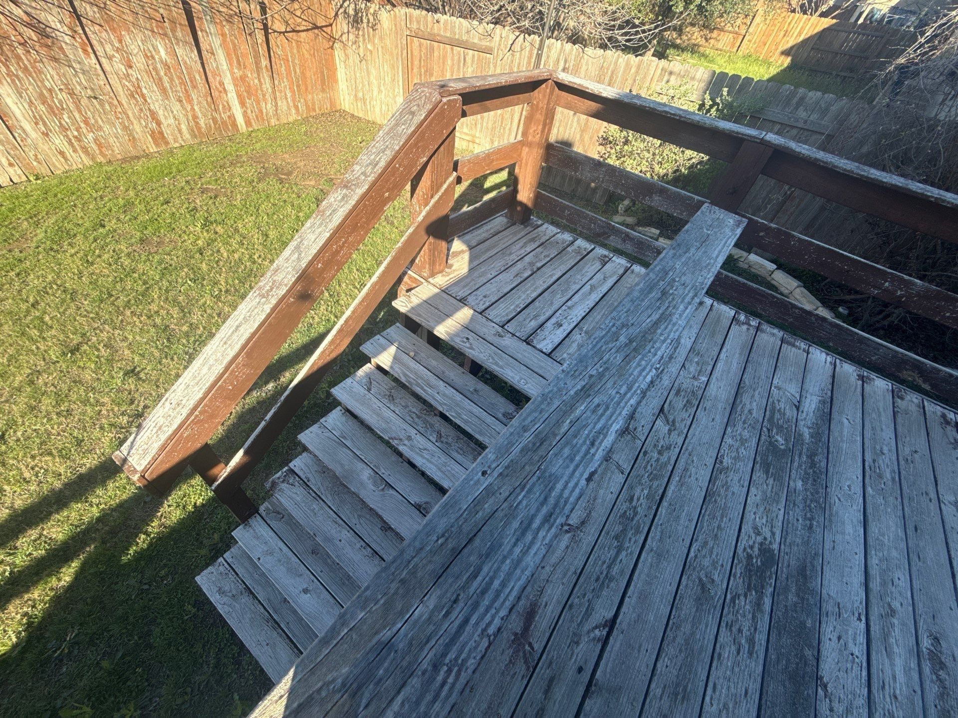 Deck stairs ahead of staining in Cedar Park, TX by Hill Country Painting