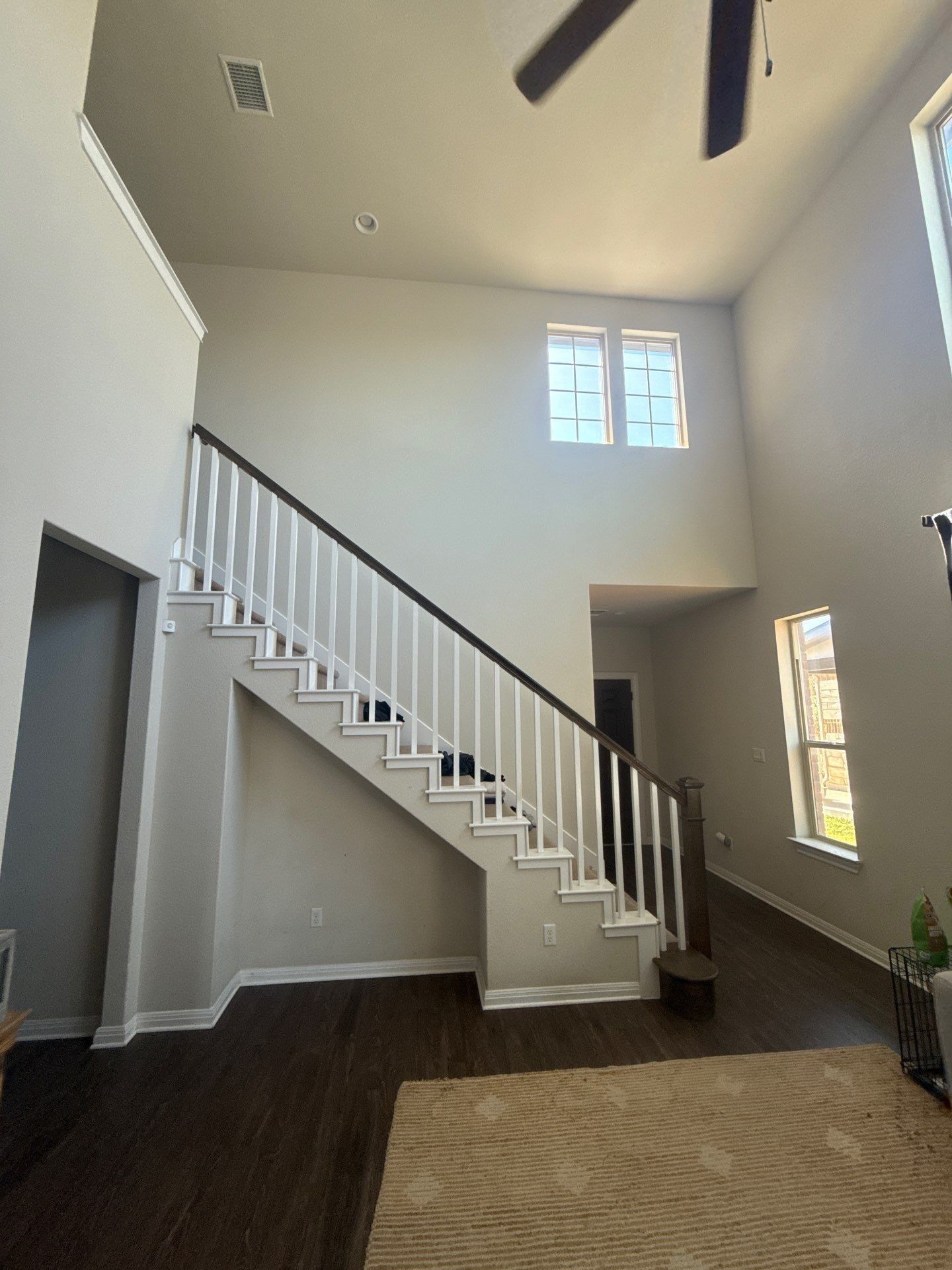 Entryway and staircase ahead of interior painting in Austin, TX by Hill Country Painting