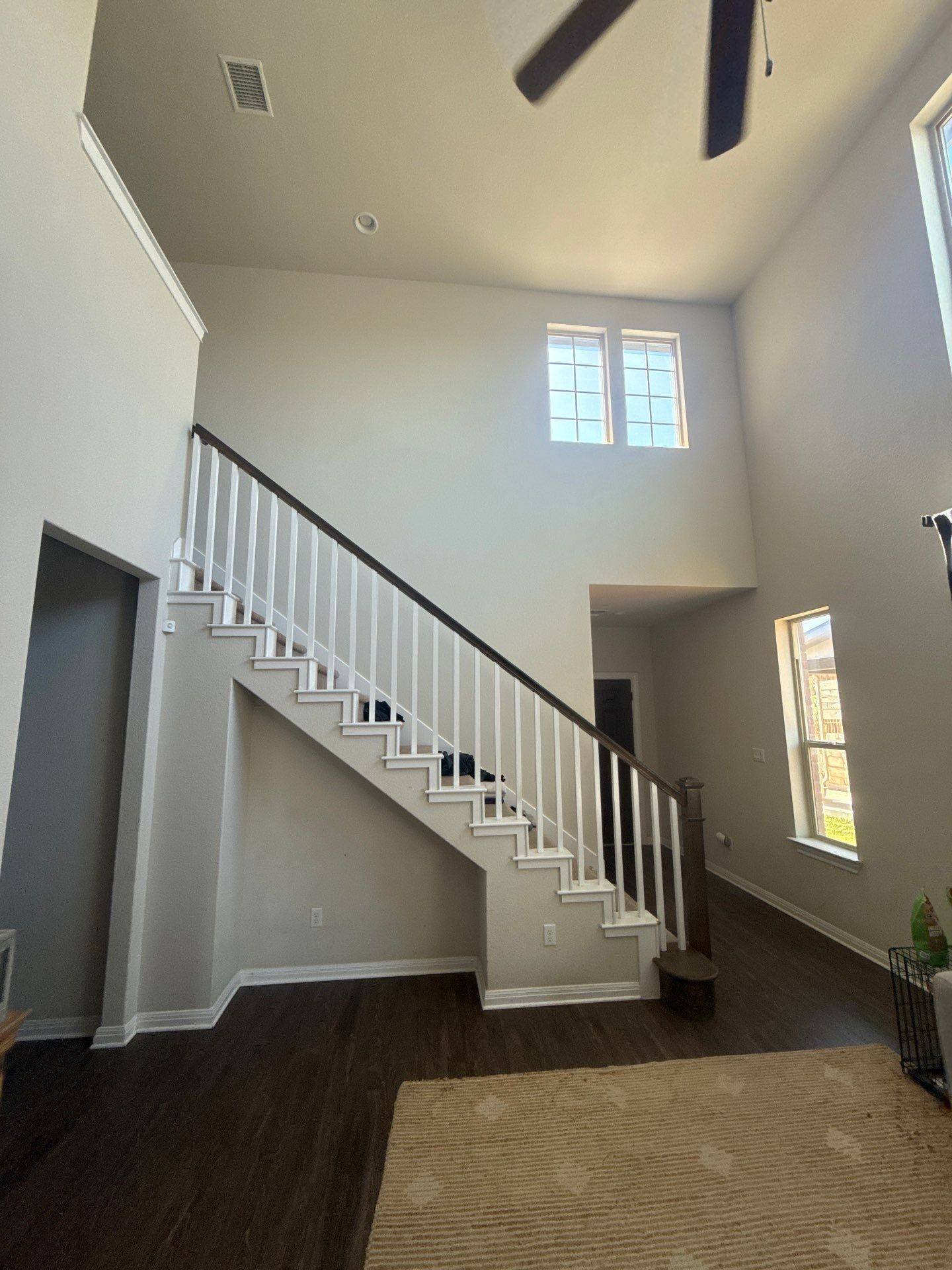 Entryway and staircase ahead of interior painting in Austin, TX by Hill Country Painting