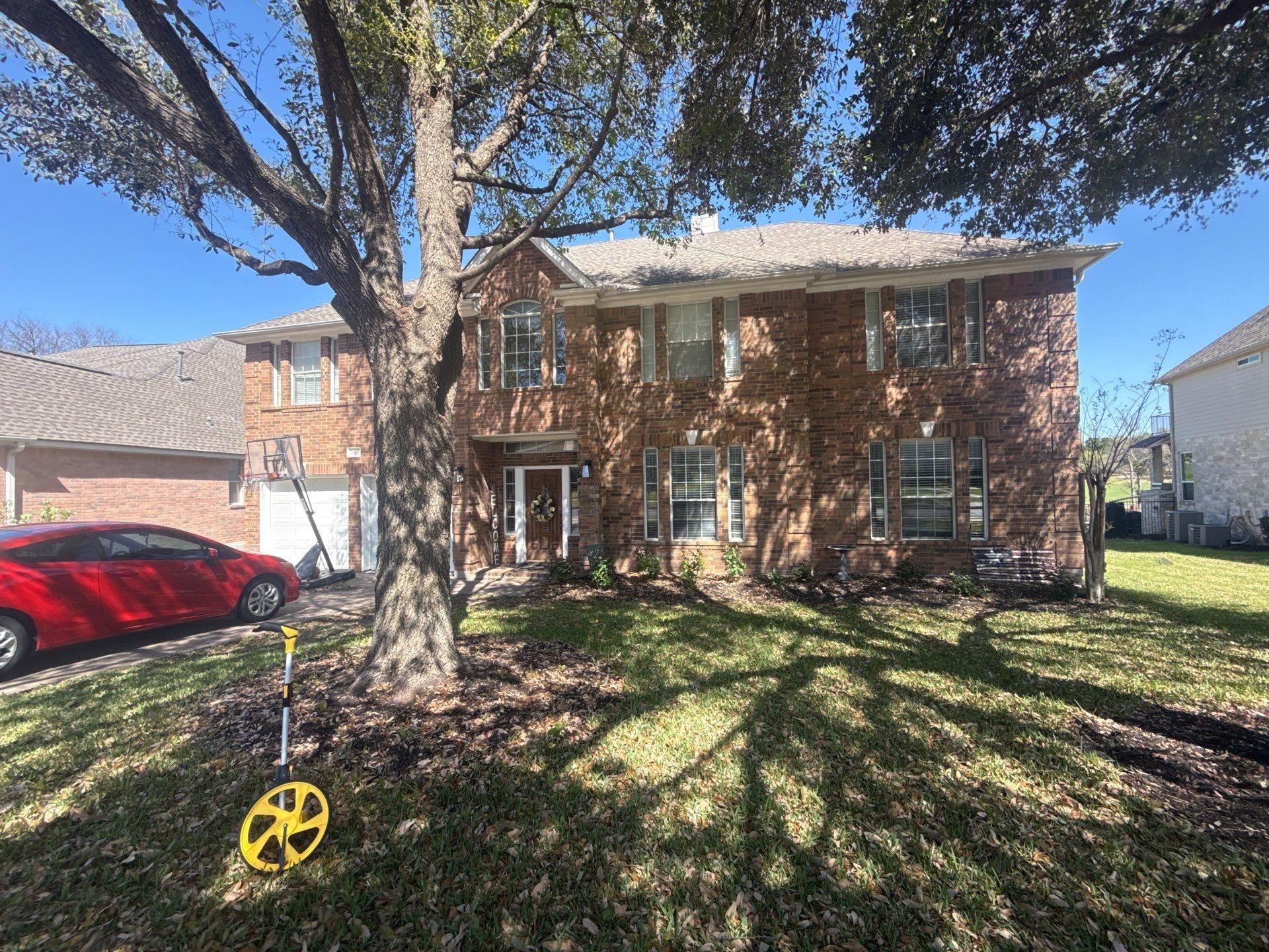 Front of house ahead of exterior painting in Round Rock, TX by Hill Country Painting