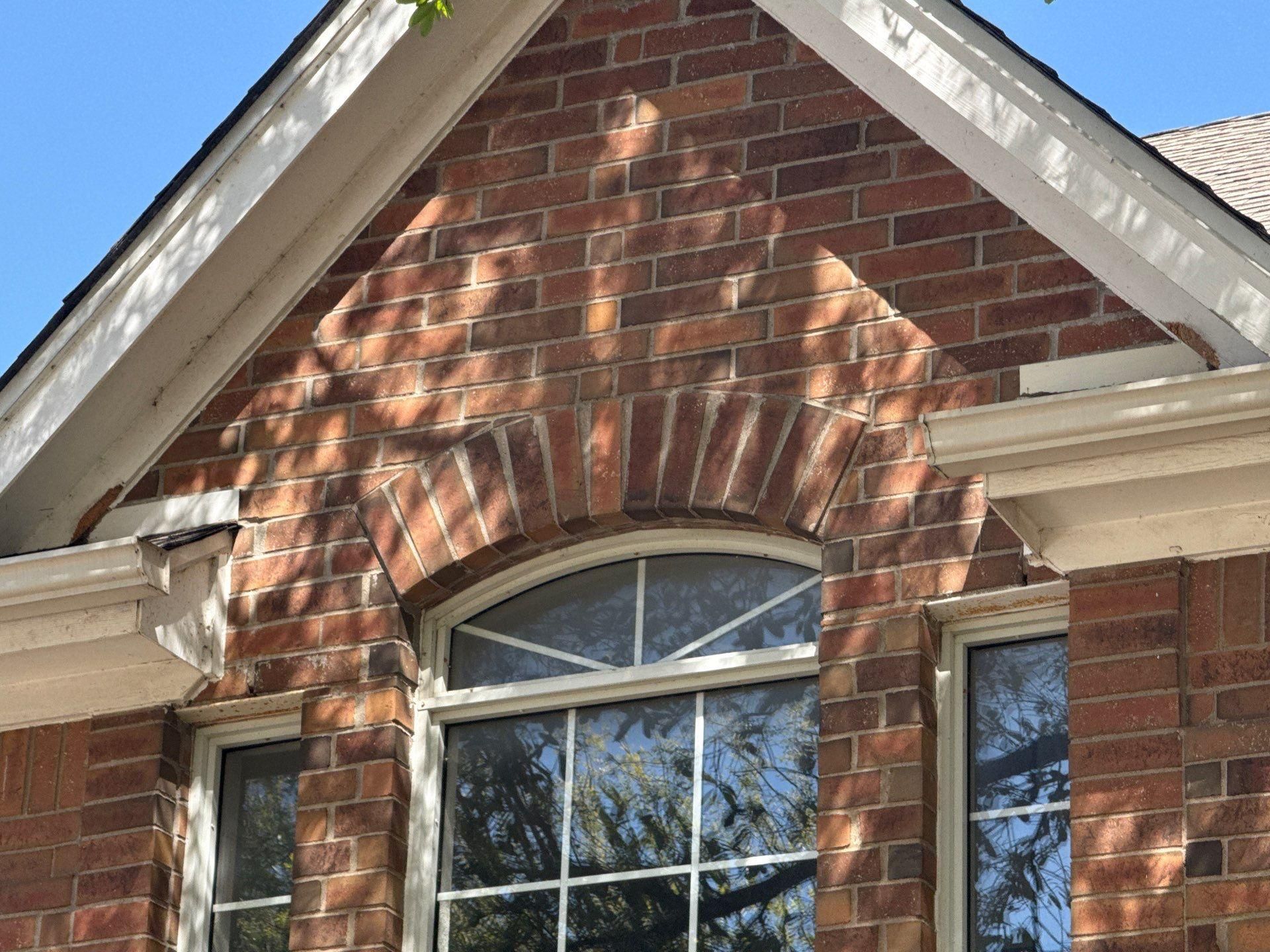 Front gable trim ahead of carpentry repair and painting in Round Rock, TX by Hill Country Painting