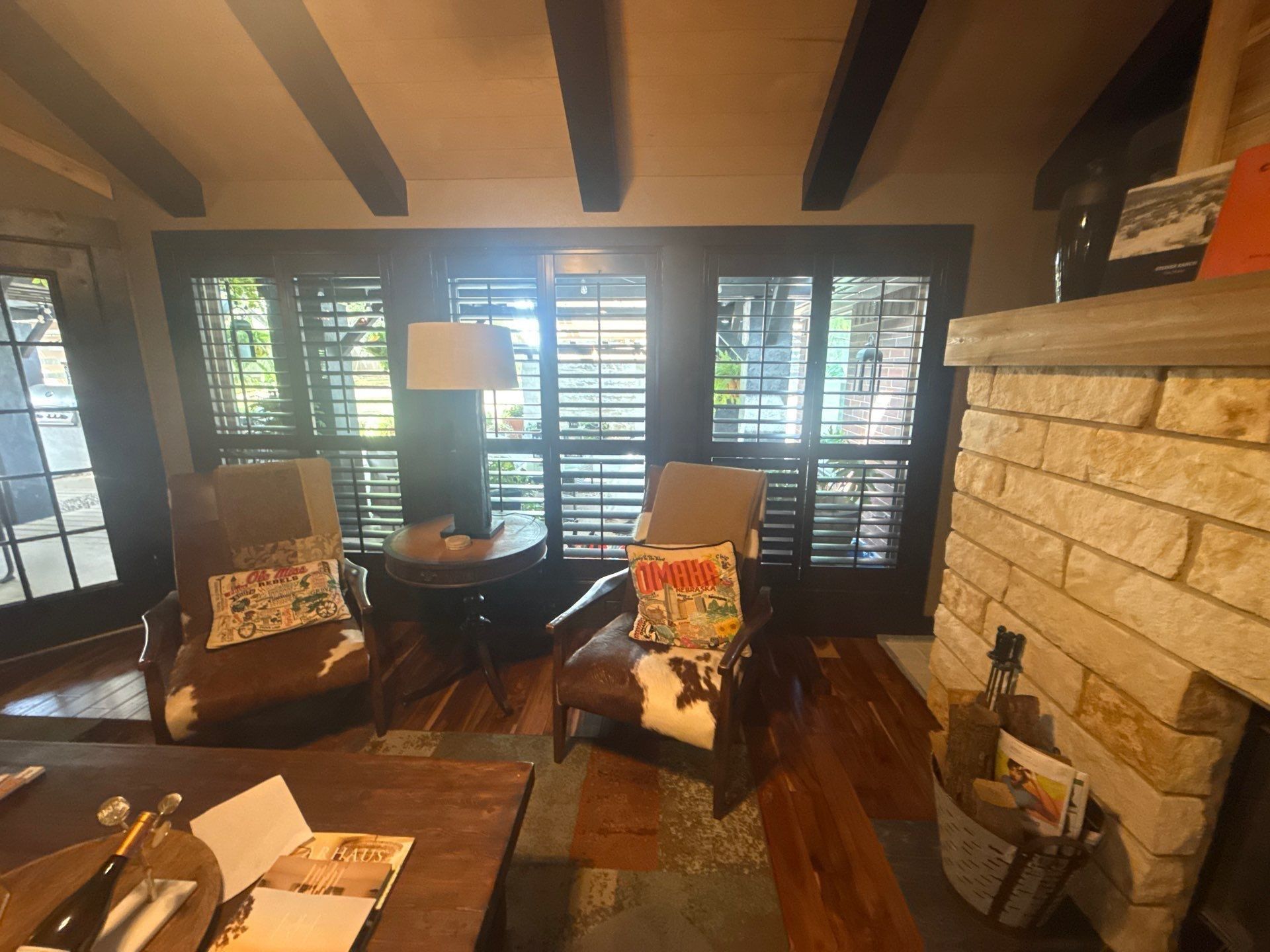 Living room shutters and trim ahead of interior painting in Austin, TX by Hill Country Painting