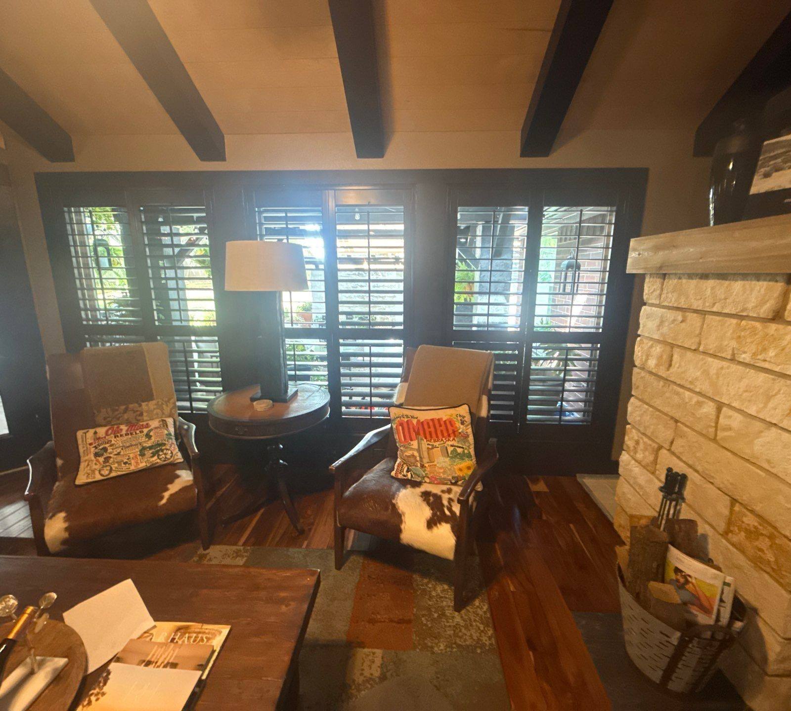 Living room shutters and trim ahead of interior painting in Austin, TX by Hill Country Painting