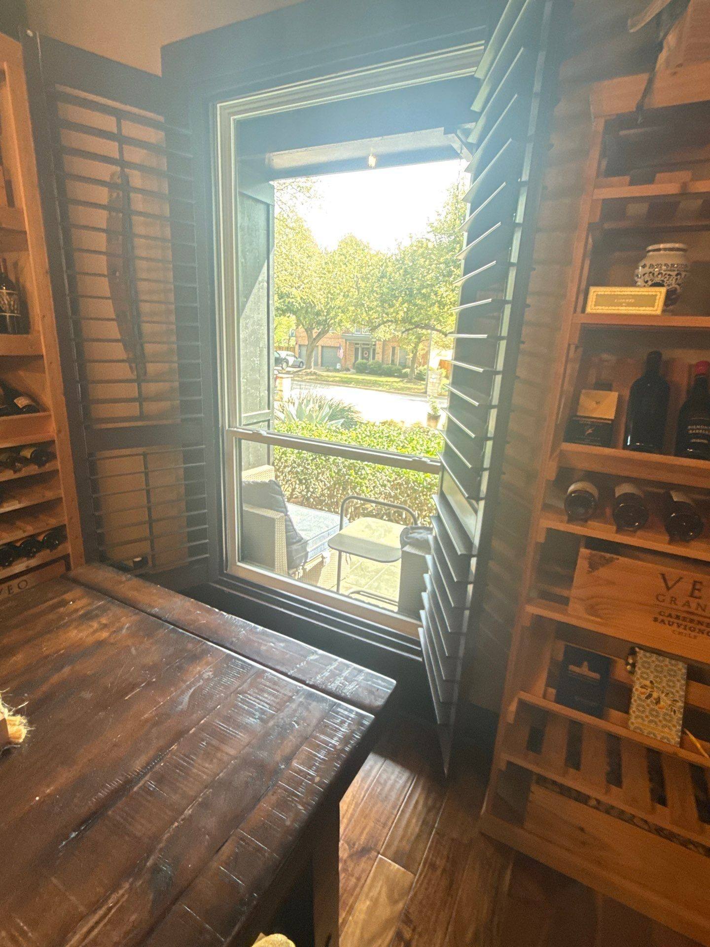 Wine room shutters ahead of interior painting in Austin, TX by Hill Country Painting