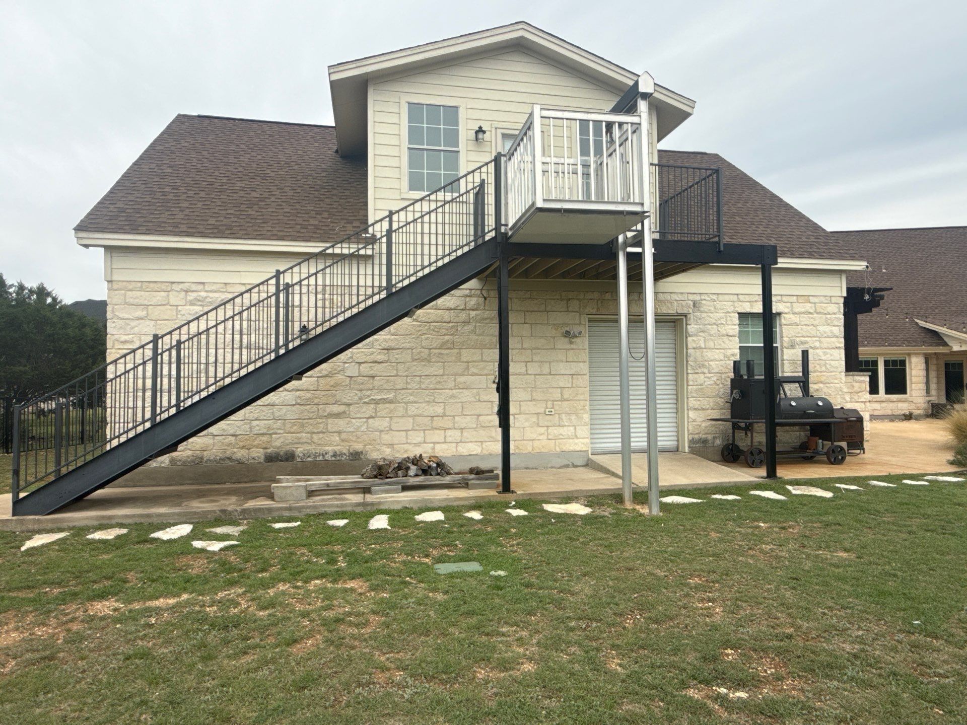 Exterior of house ahead of exterior painting in Leander, TX by Hill Country Painting