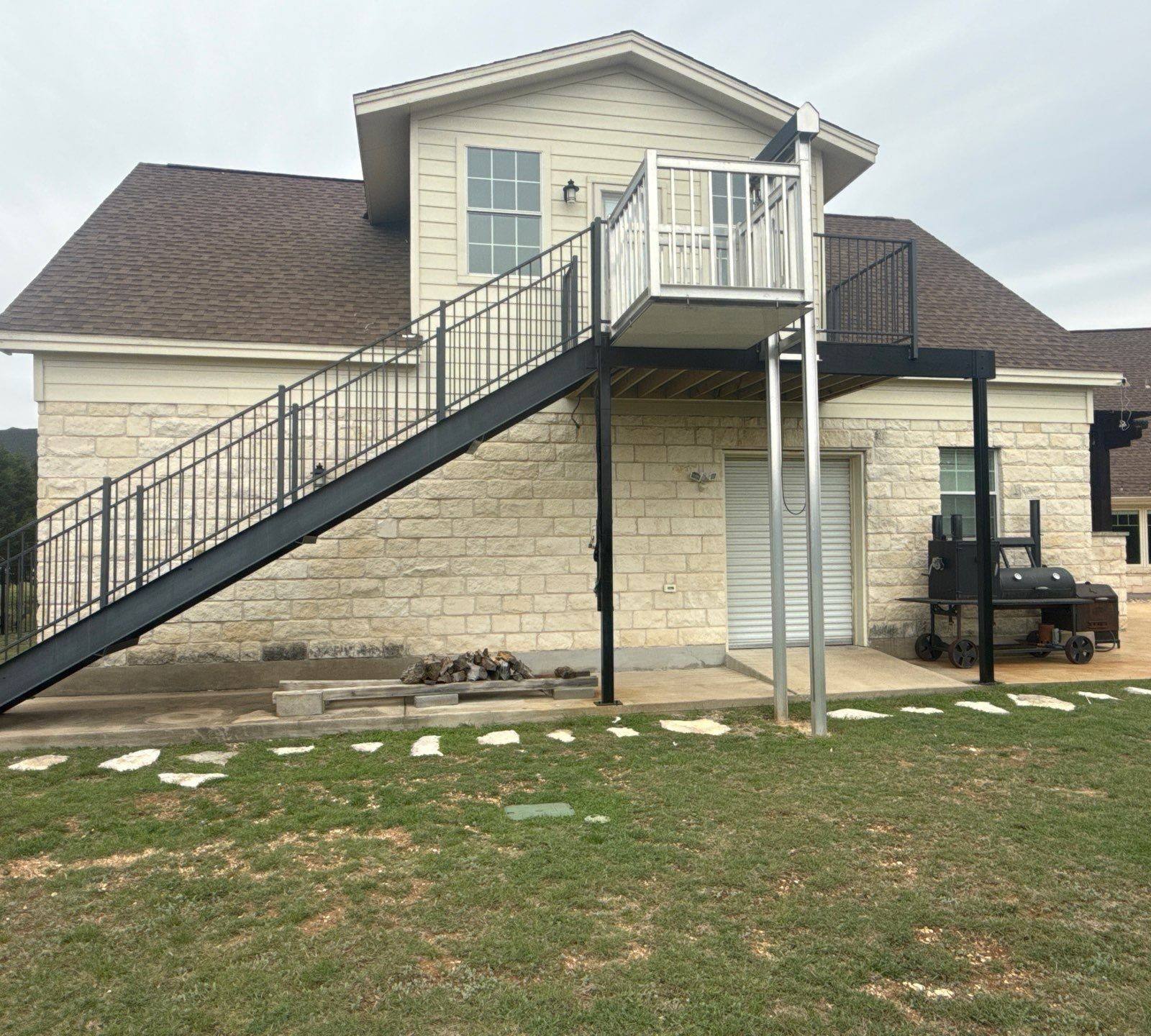 Exterior of house ahead of exterior painting in Leander, TX by Hill Country Painting