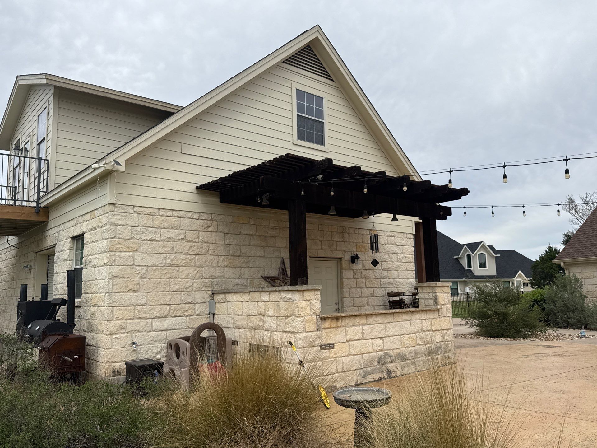 Back of house ahead of exterior painting in Leander, TX by Hill Country Painting