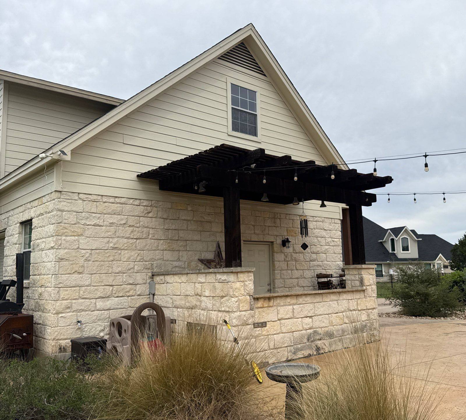 Back of house ahead of exterior painting in Leander, TX by Hill Country Painting