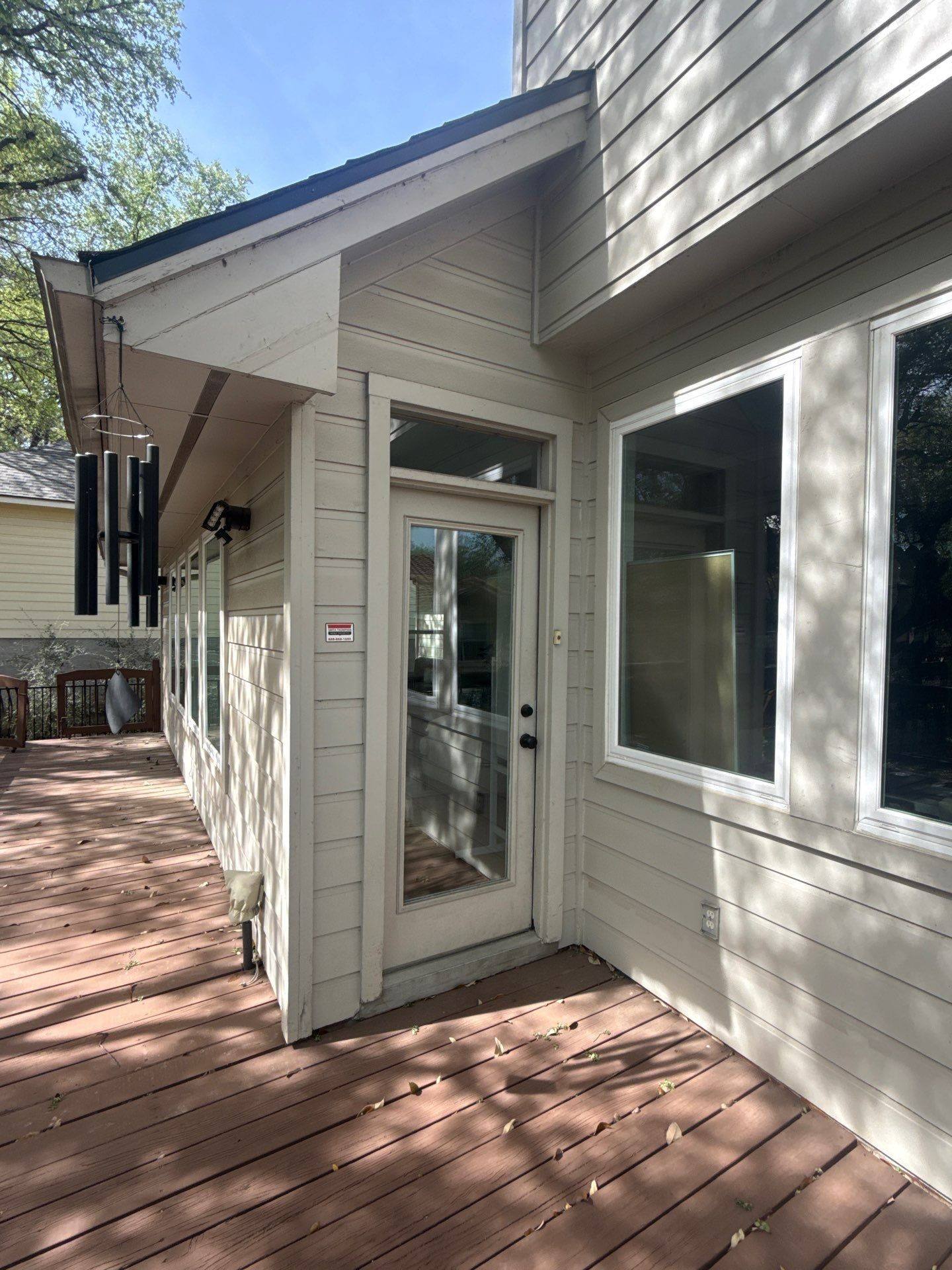 Back porch and door ahead of exterior painting in Austin, TX by Hill Country Painting