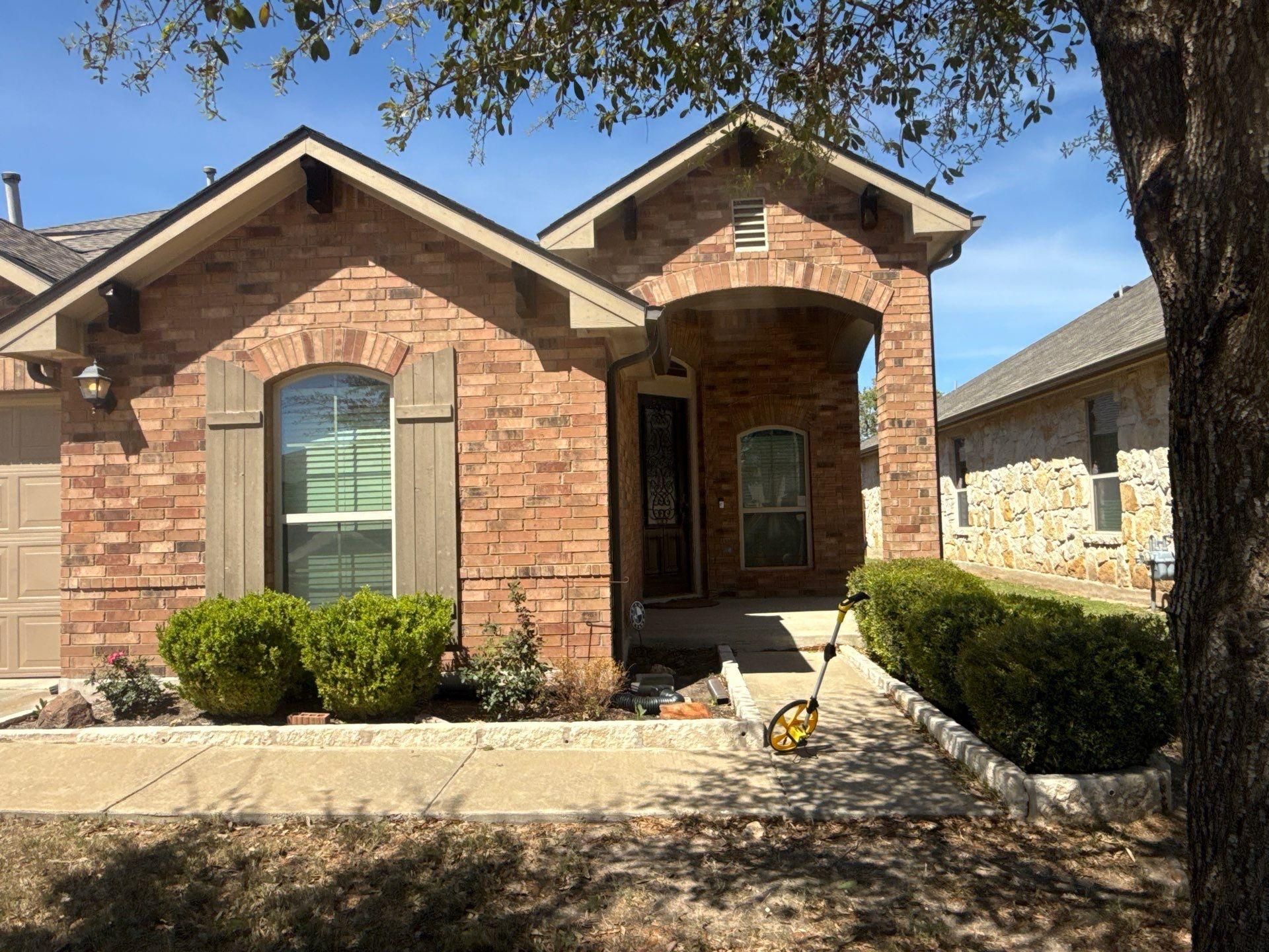 Front entry ahead of exterior painting in Leander, TX by Hill Country Painting