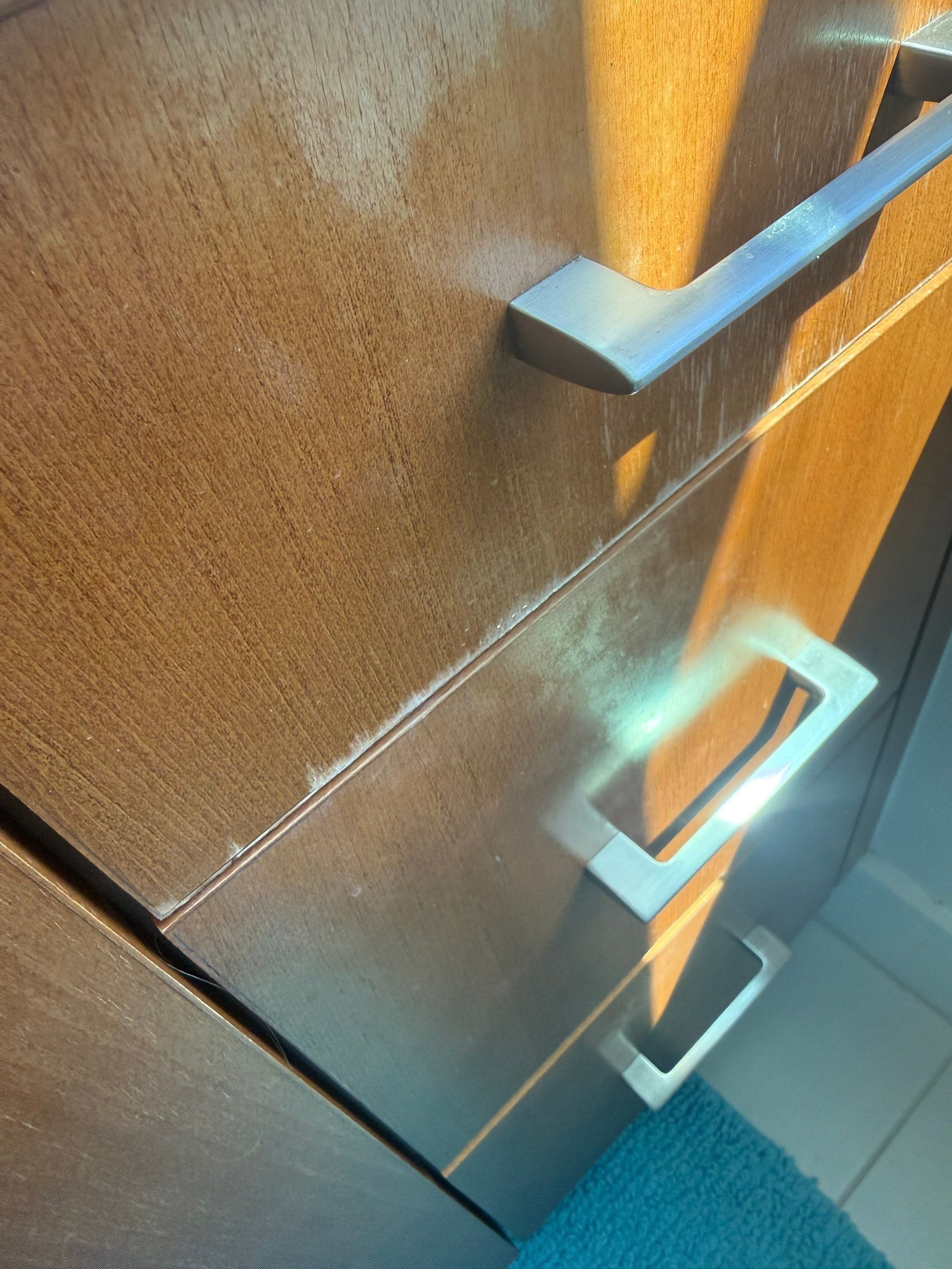 Cabinet door detail ahead of cabinet painting in Austin, TX by Hill Country Painting