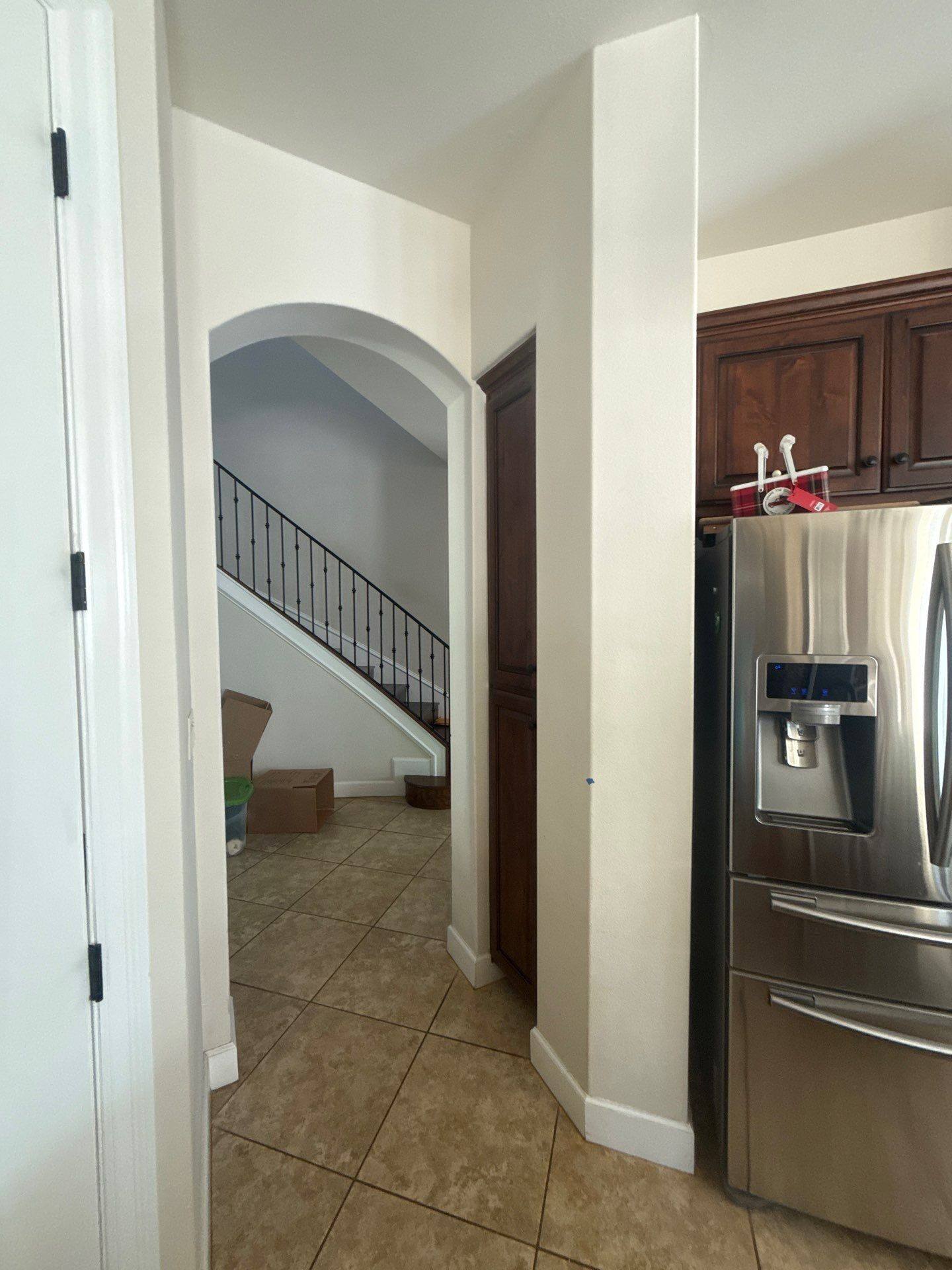 Kitchen and hallway ahead of painting in Austin, TX by Hill Country Painting