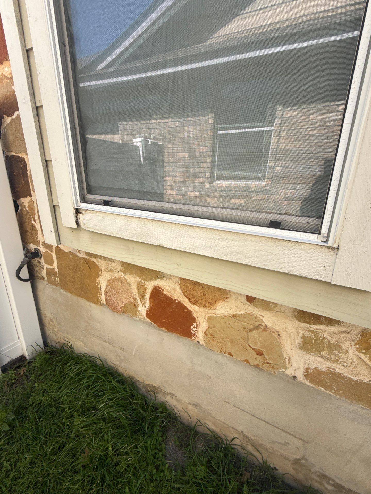 Siding repair area ahead of exterior painting in Pflugerville, TX by Hill Country Painting