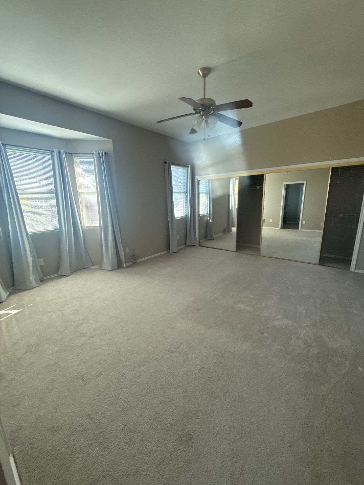 Master bedroom ahead of interior painting in Austin, TX by Hill Country Painting