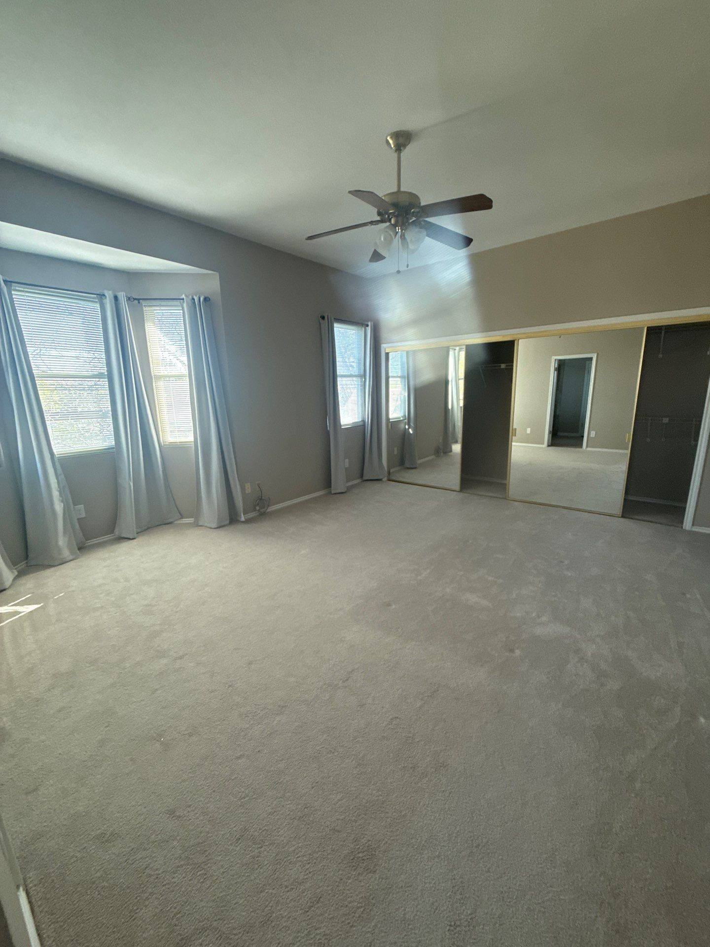 Master bedroom ahead of interior painting in Austin, TX by Hill Country Painting