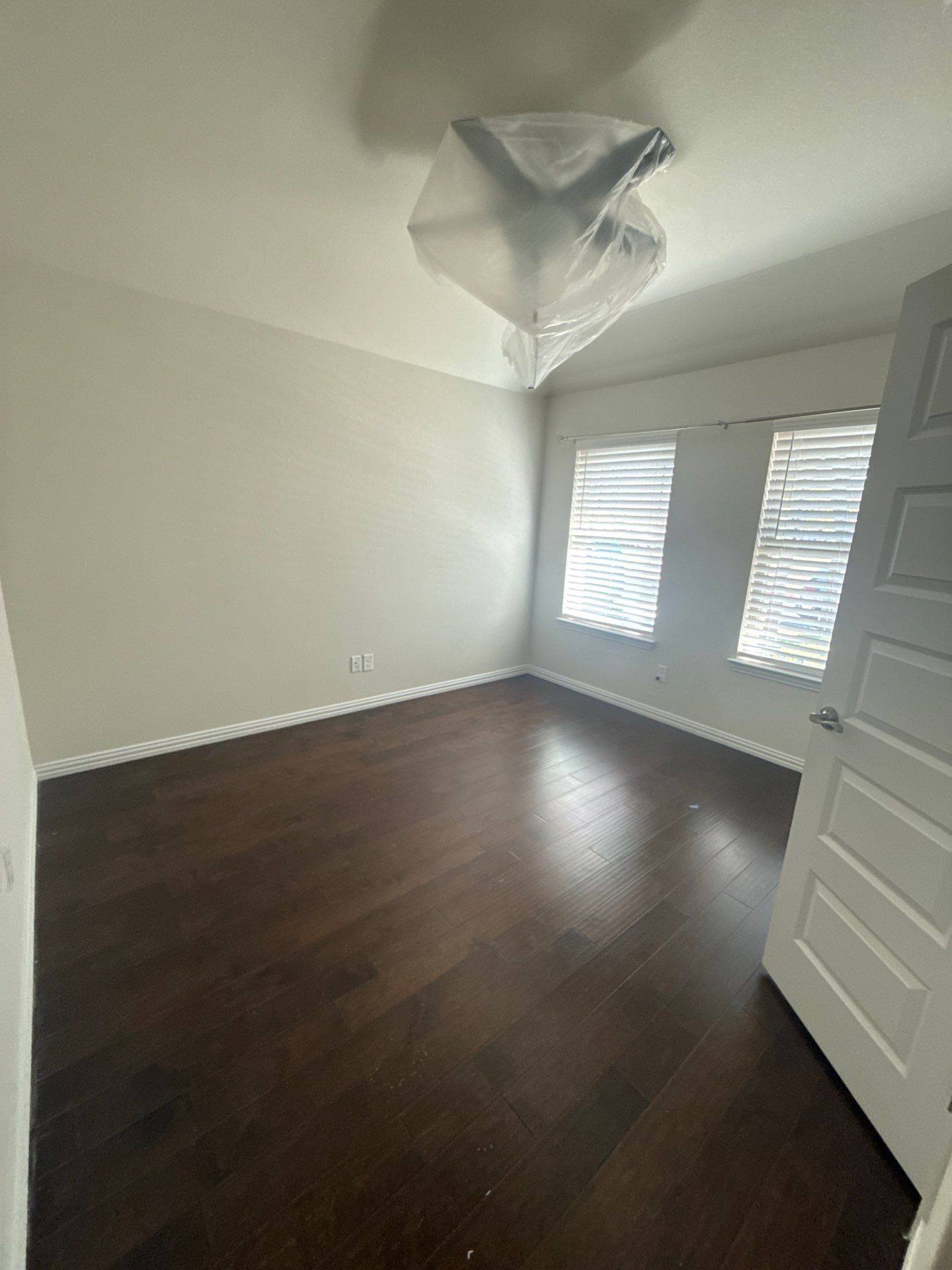Front bedroom ahead of interior painting in Buda, TX by Hill Country Painting