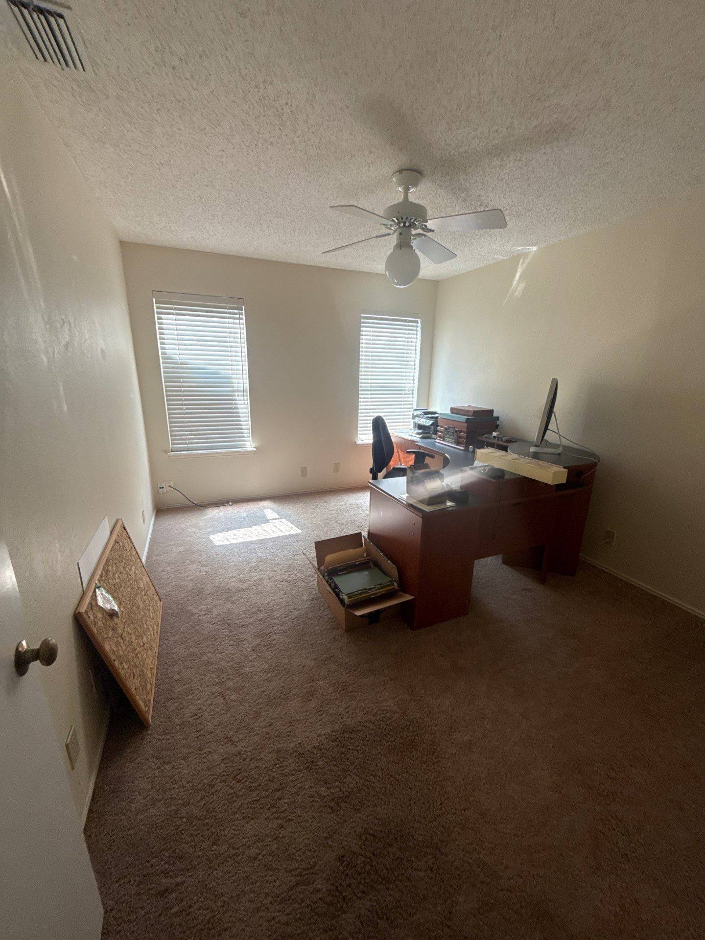 Office ahead of interior painting in Lakeway, TX by Hill Country Painting