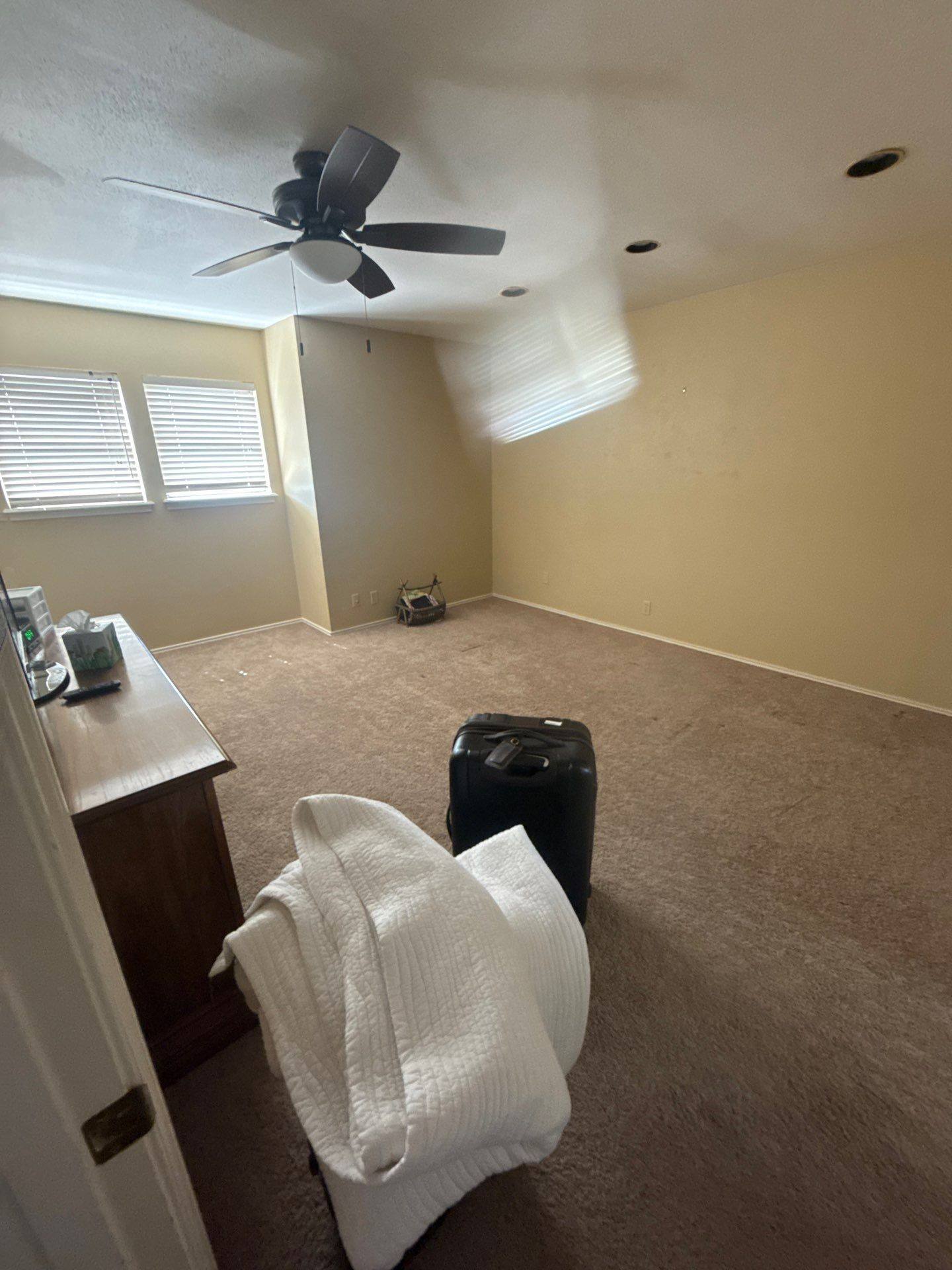 Upstairs bedroom ahead of interior painting in Lakeway, TX by Hill Country Painting