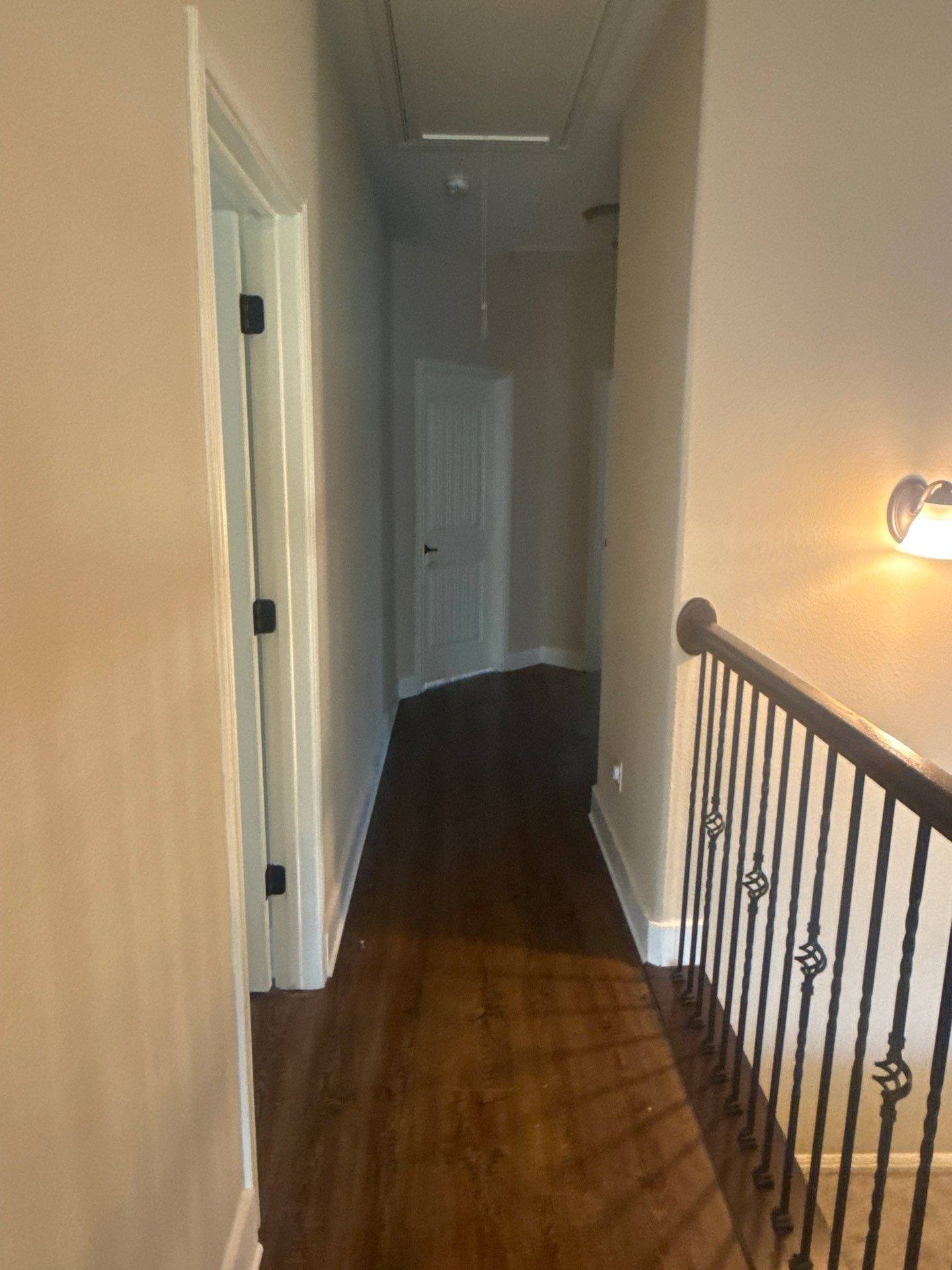 Upstairs hallway ahead of painting in Round Rock, TX by Hill Country Painting