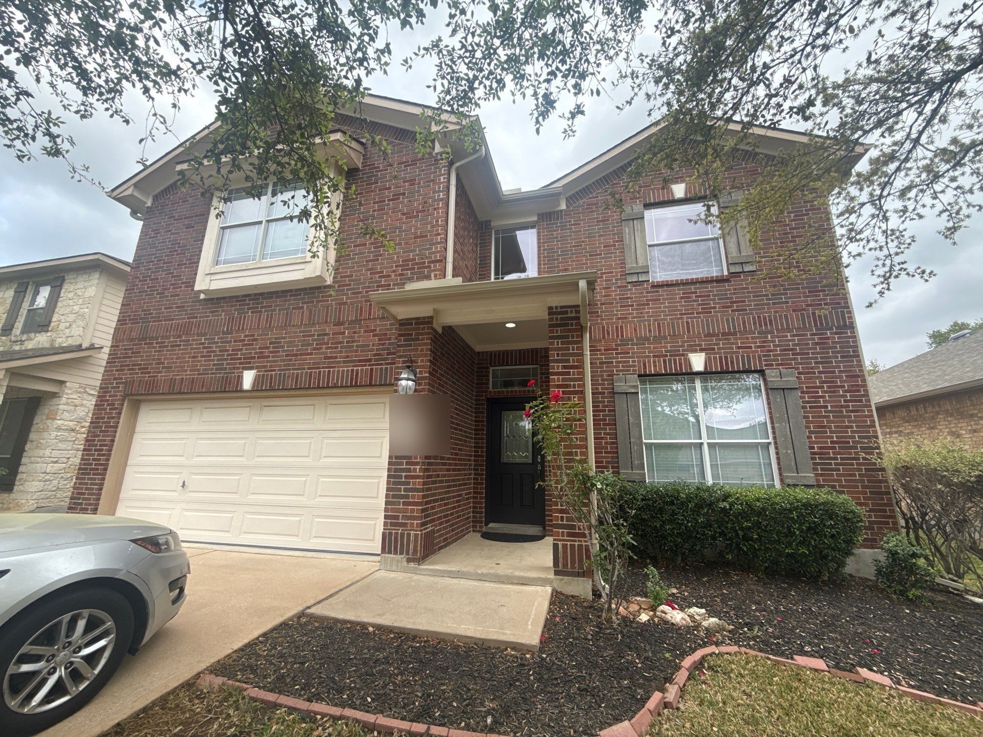 Front exterior ahead of painting in Cedar Park, TX by Hill Country Painting
