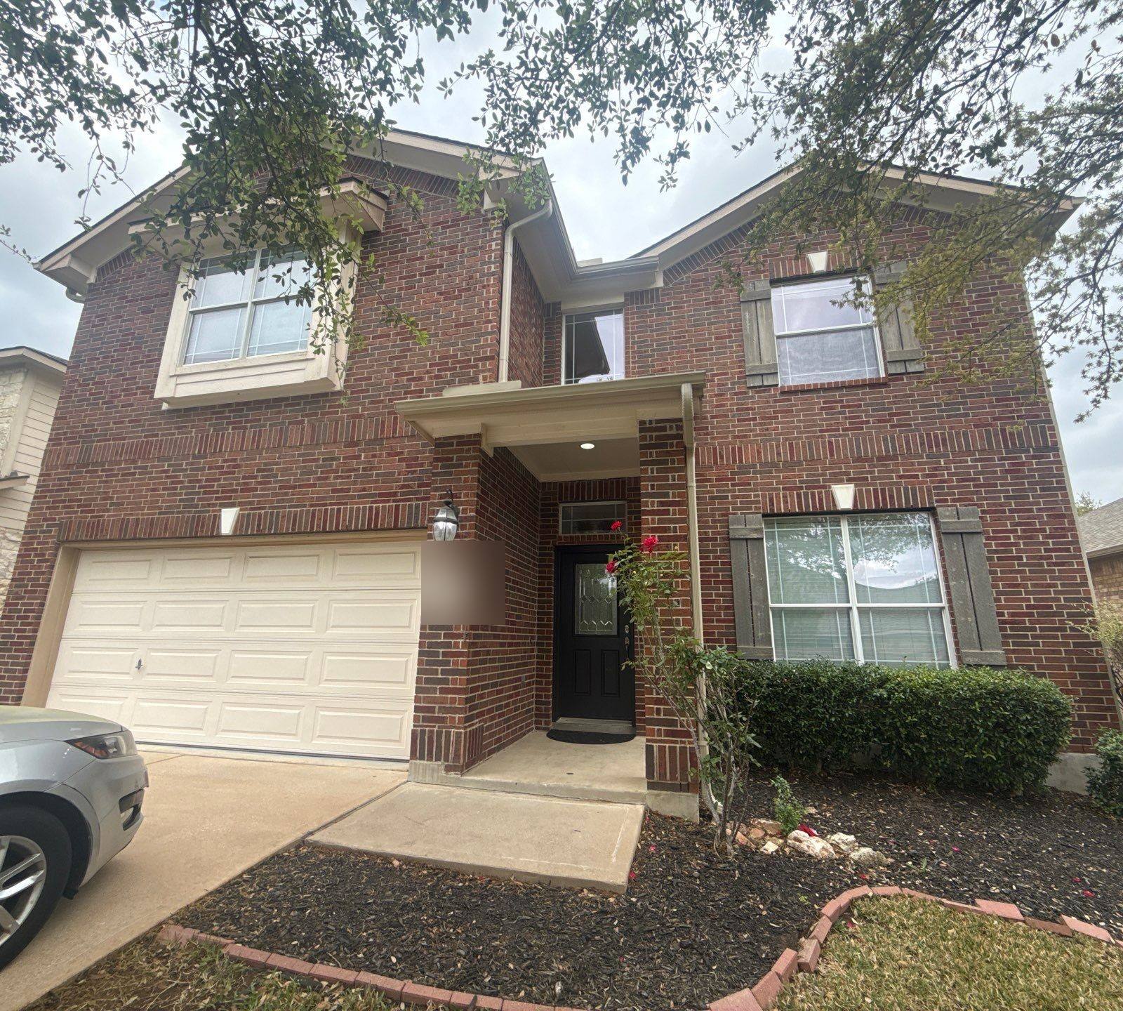Front exterior ahead of painting in Cedar Park, TX by Hill Country Painting