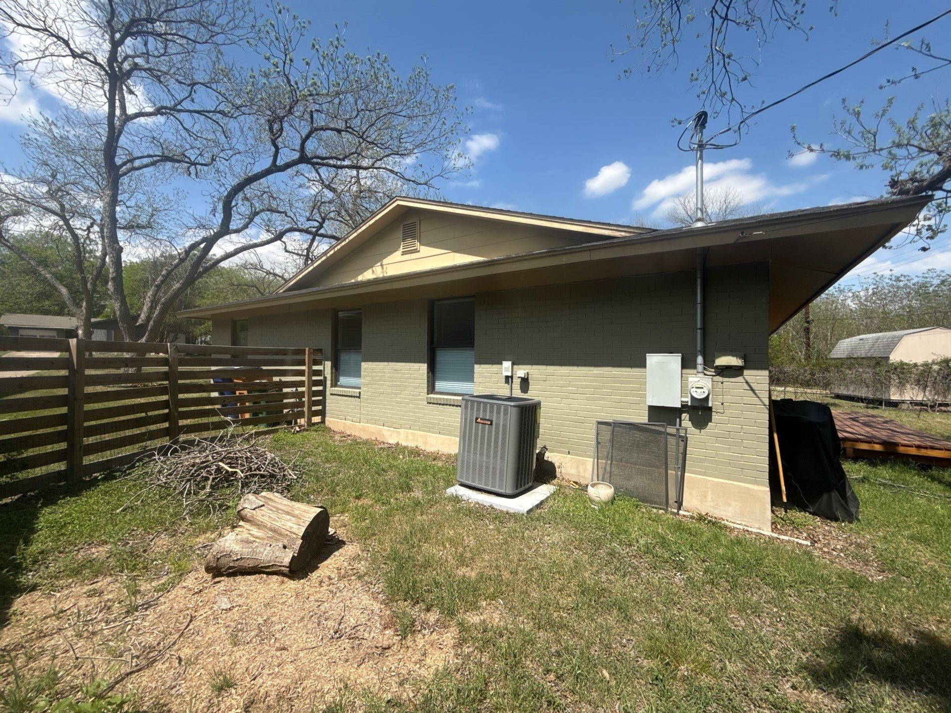 Side exterior ahead of painting in Austin, TX by Hill Country Painting