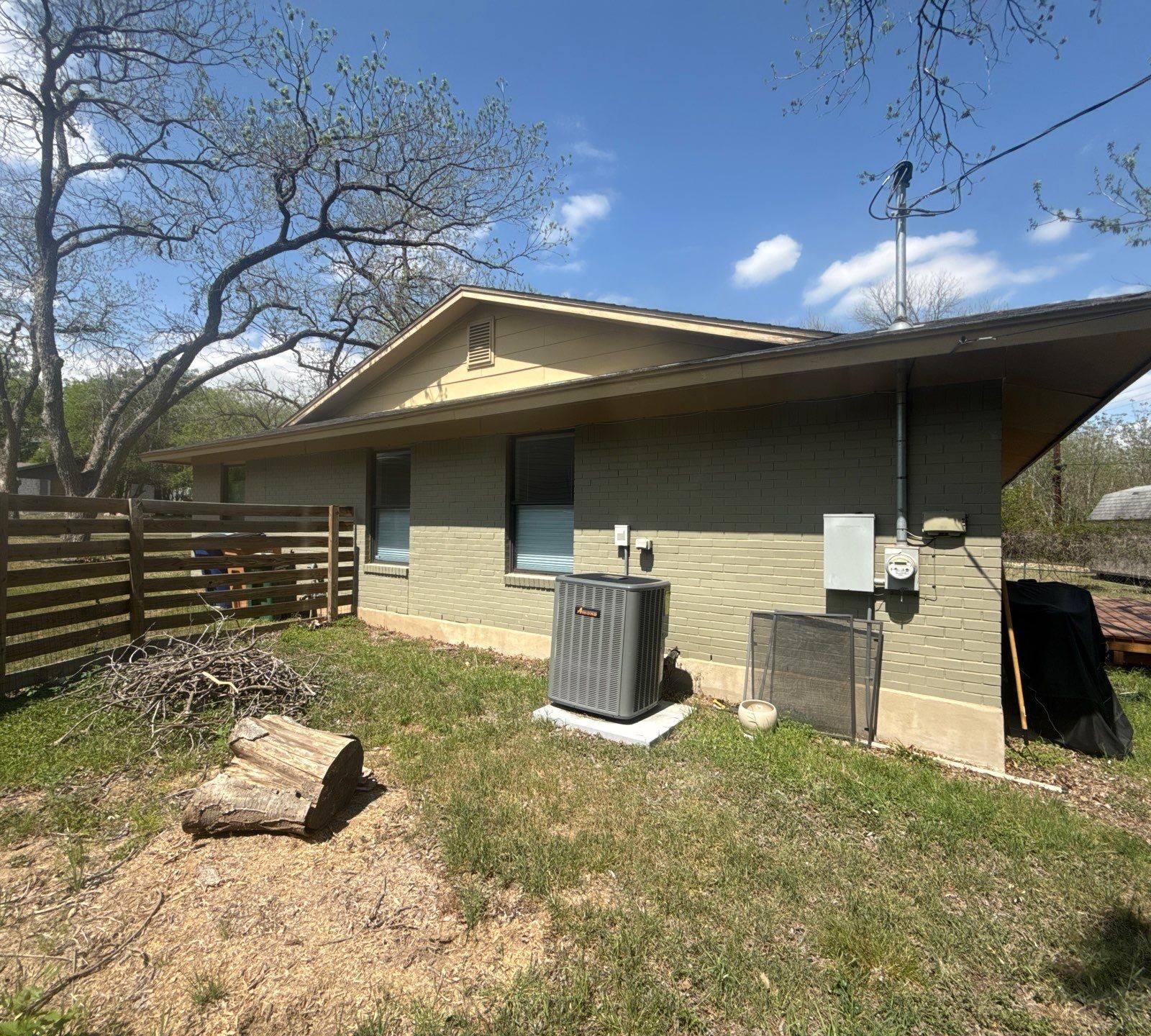 Side exterior ahead of painting in Austin, TX by Hill Country Painting