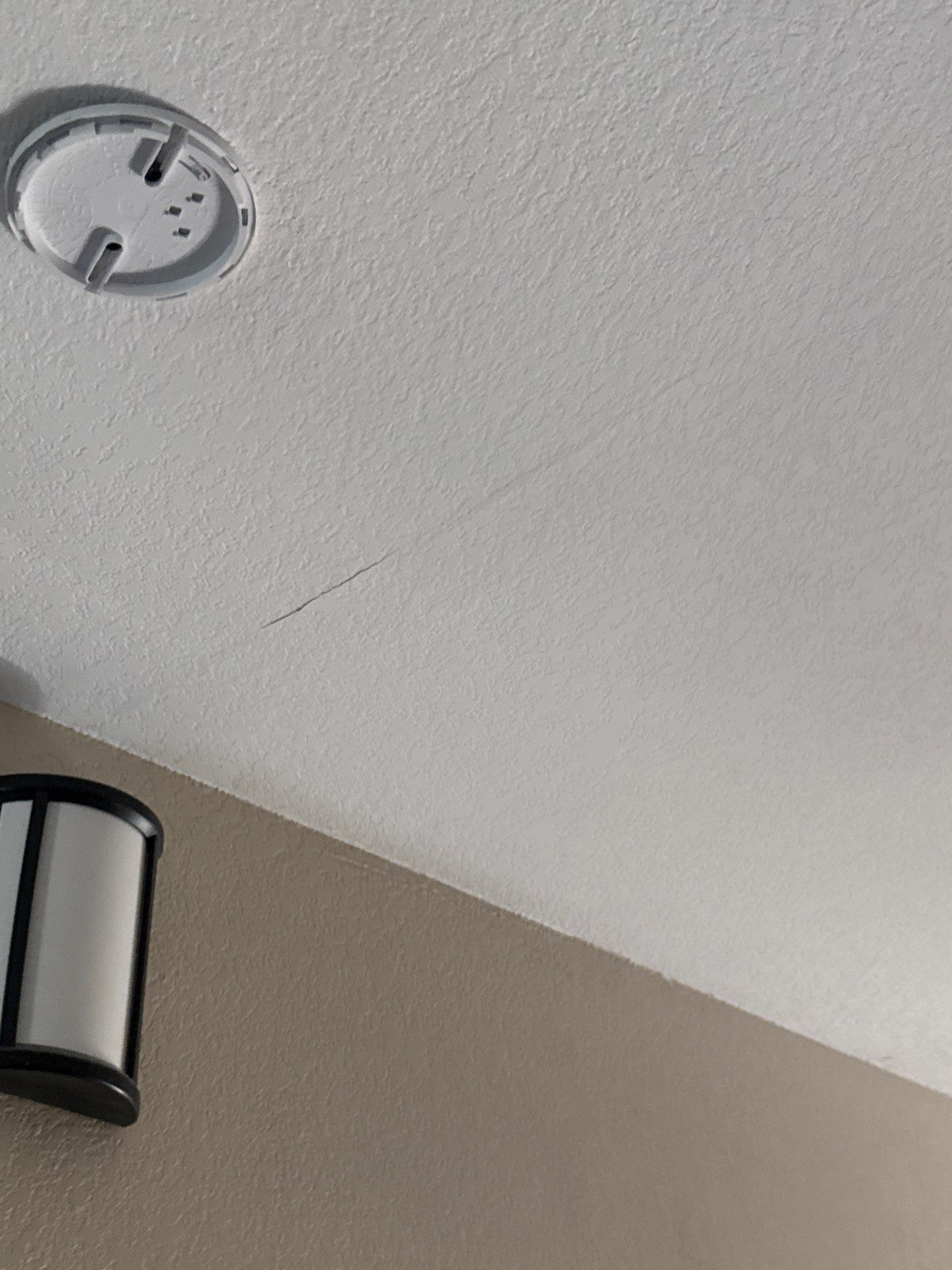 Loft ceiling repair area ahead of painting in Hutto, TX by Hill Country Painting