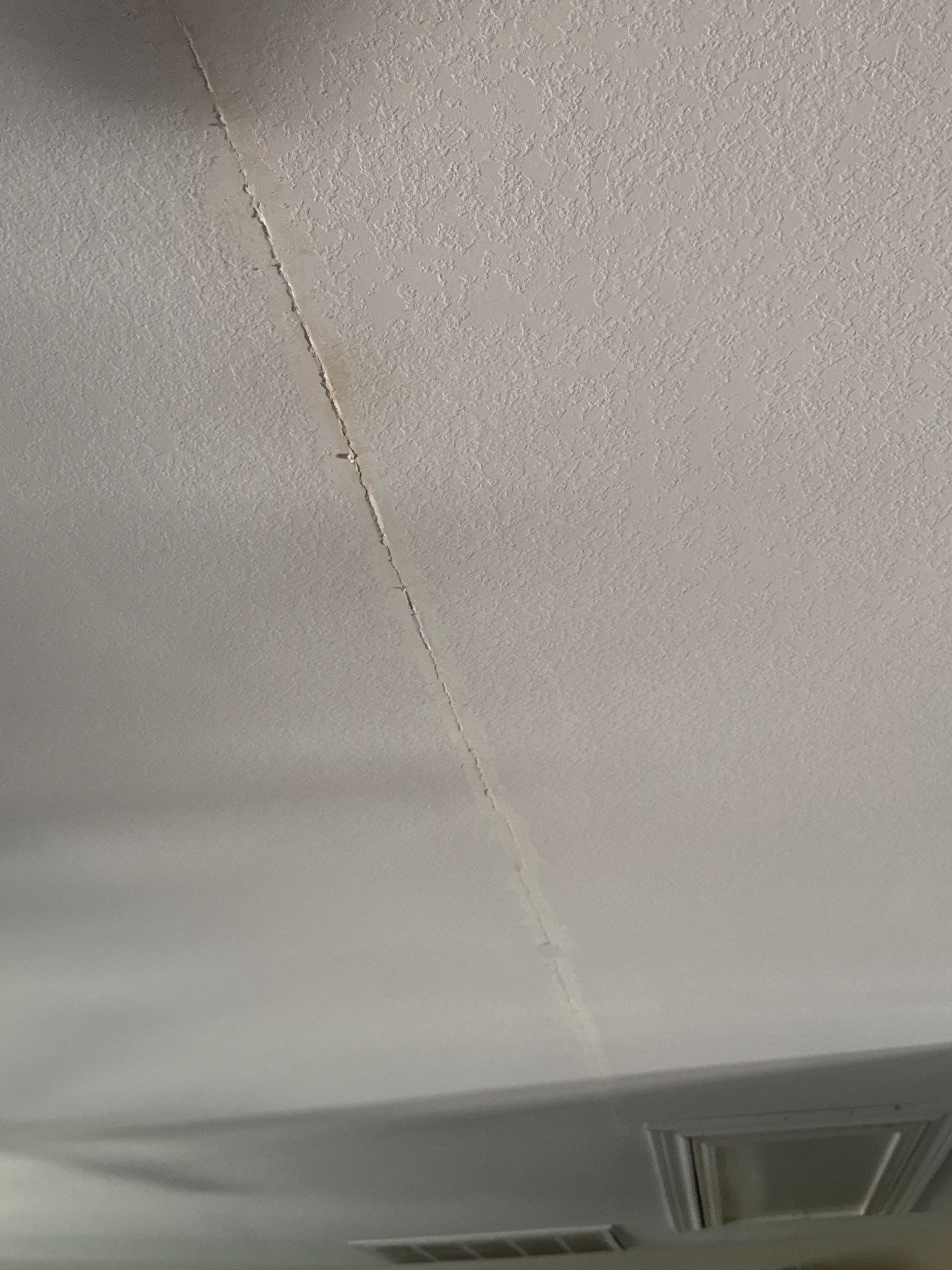Ceiling drywall repair detail ahead of painting in Hutto, TX by Hill Country Painting