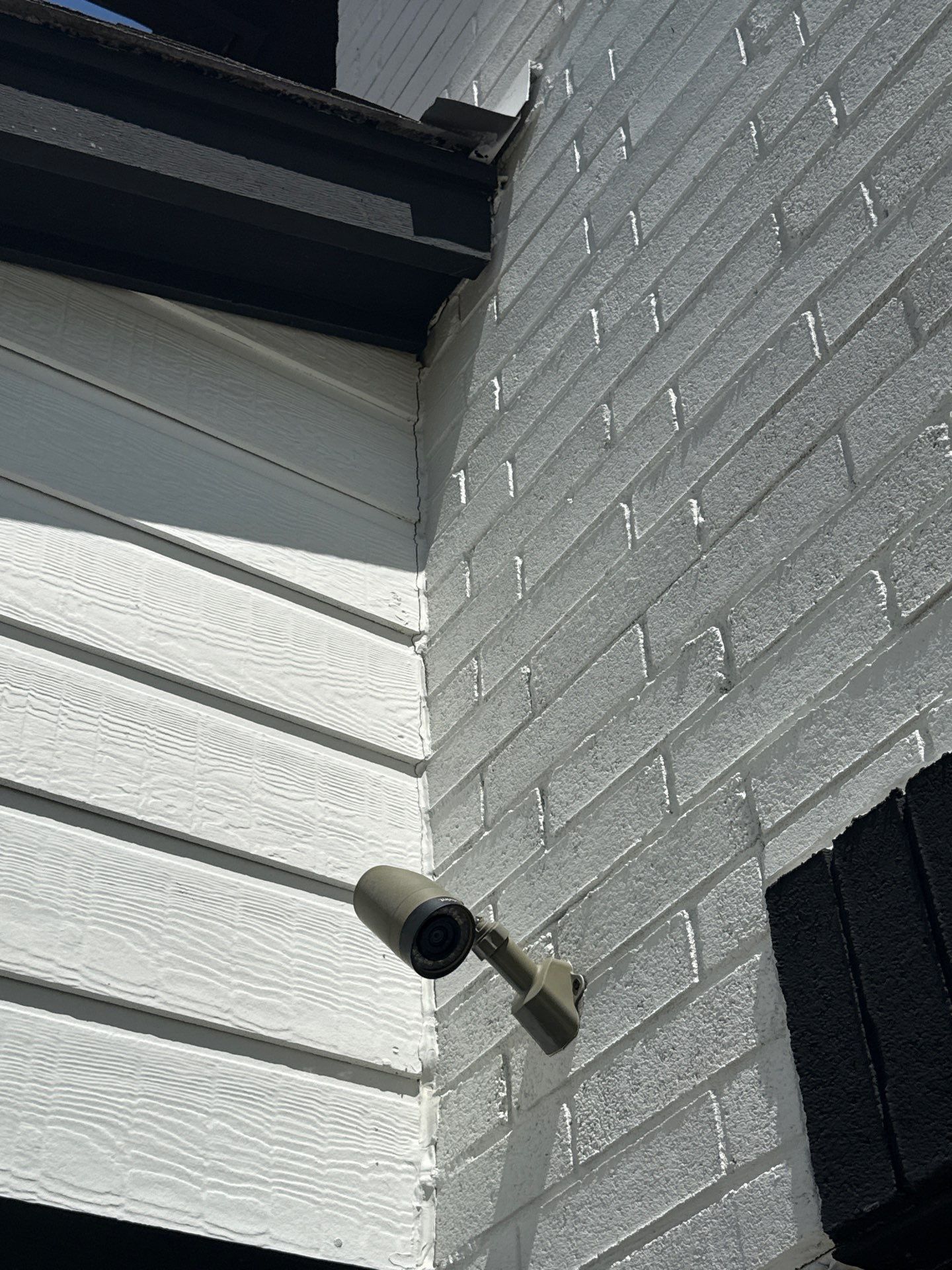 Exterior siding and trim repair area in Hutto, TX by Hill Country Painting