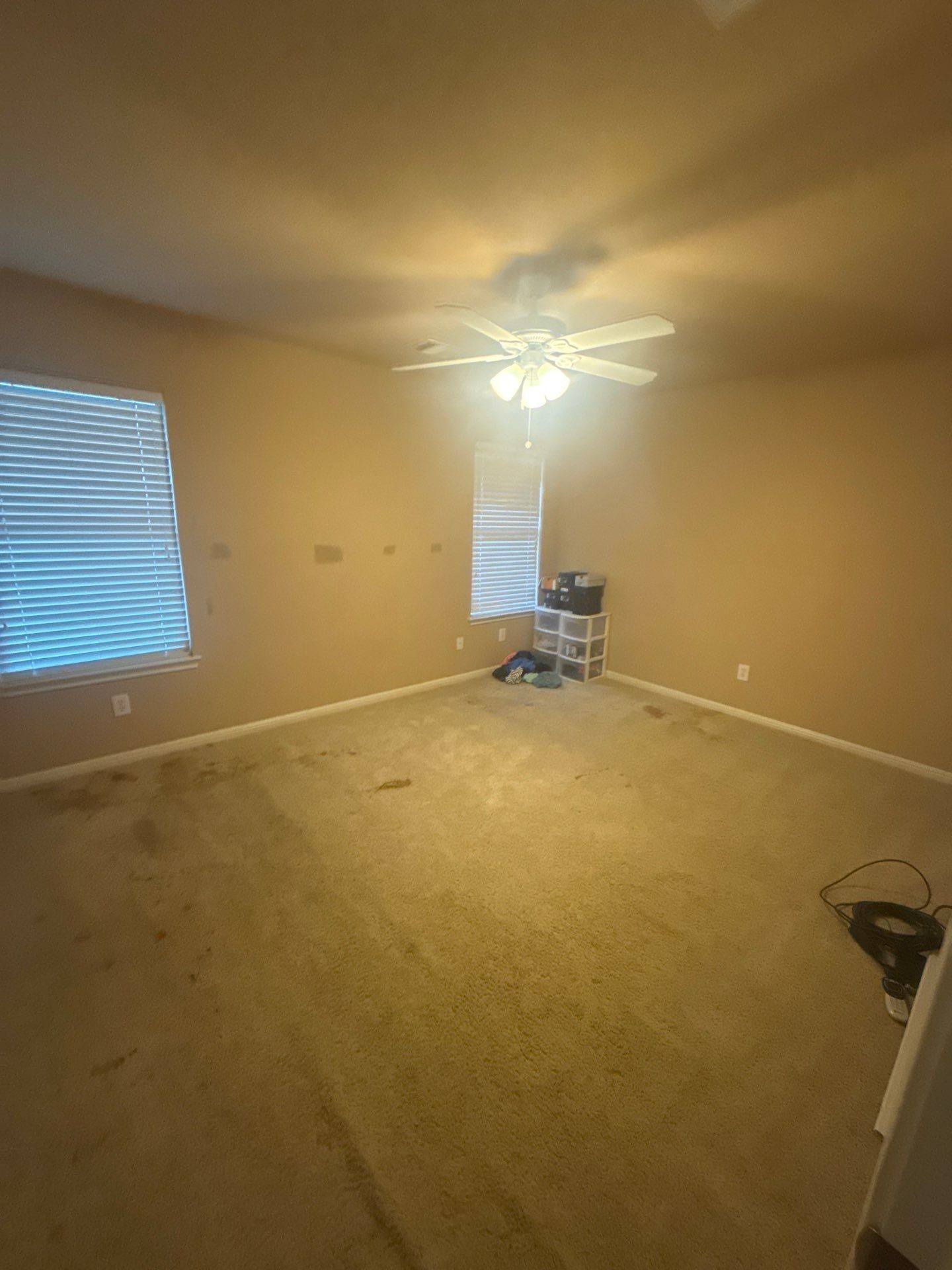 Upstairs bedroom ahead of painting in Pflugerville, TX by Hill Country Painting