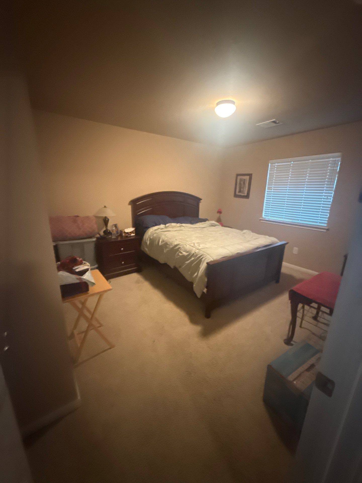 Bedroom ahead of painting in Pflugerville, TX by Hill Country Painting