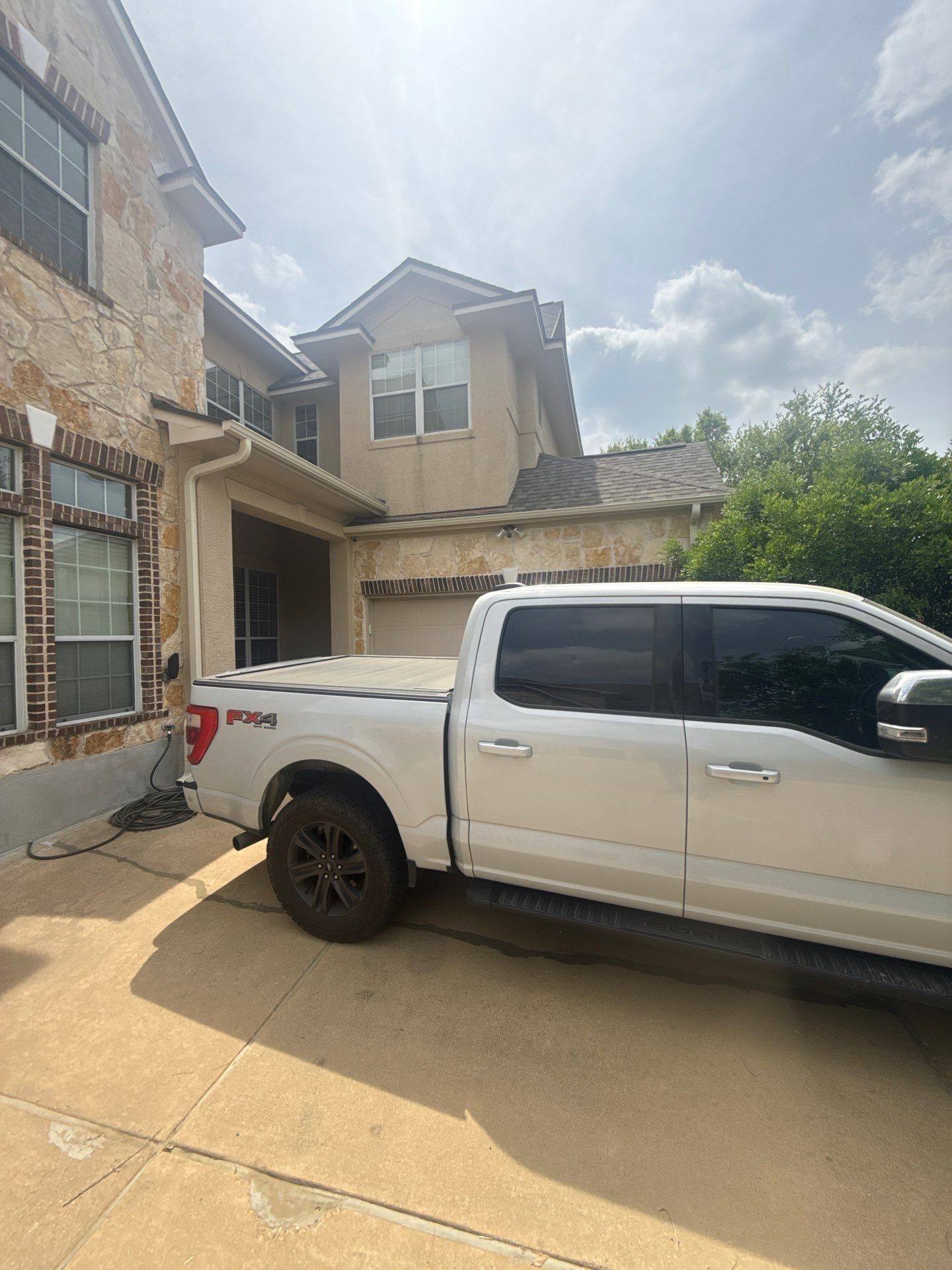 Front corner tower ahead of painting in Austin, TX by Hill Country Painting