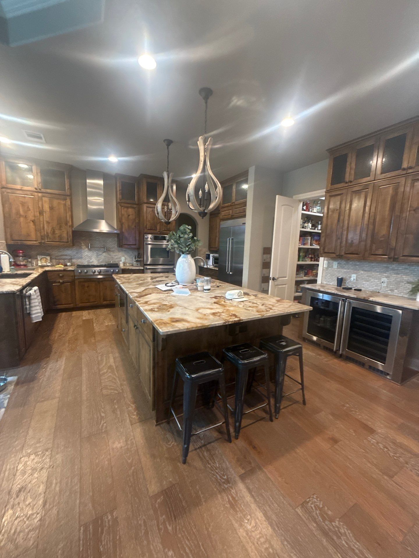 Kitchen island ahead of painting in Austin, TX by Hill Country Painting
